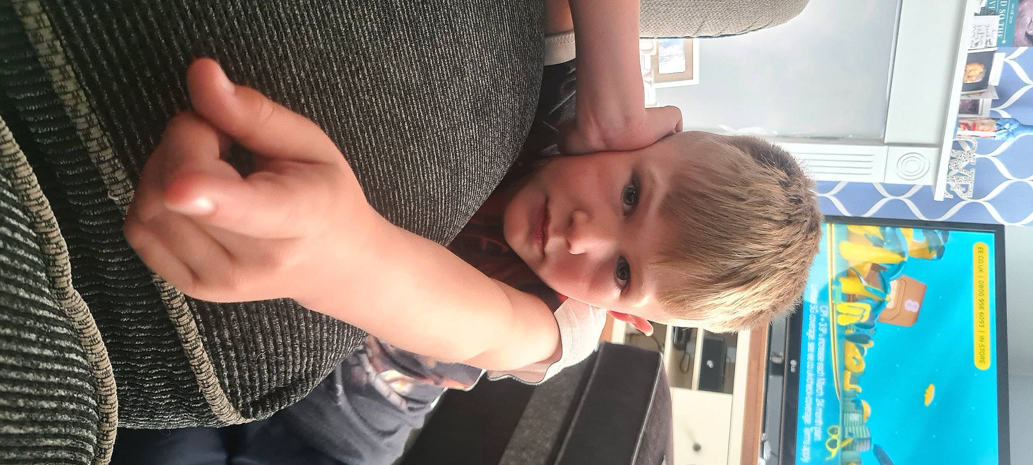 Cody-drew is registered to the contest to win money with this photo: arm, baby, clothing, cool, facial_expression, finger, fun, gesture, hand, happy, joint, mammal, mouth, nose, person, product, shoulder, skin, sleeve, thumb