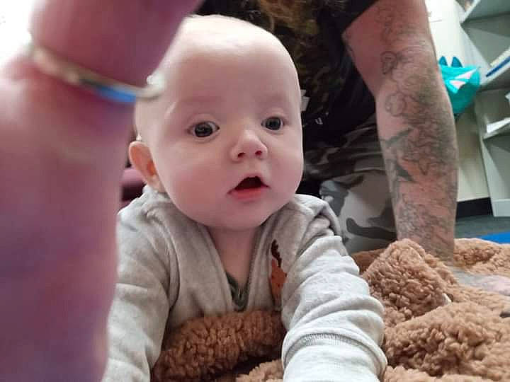 Jaylen is registered to the contest to win money with this photo: baby, baby_toddler_clothing, cheek, child, comfort, finger, flooring, fun, fur, gesture, happy, nail, nose, person, portrait_photography, sitting, skin, smile, thumb, toddler