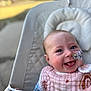 Georgia Ann joined the competition — help win amazing prizes! baby, smiling, face, blue_eyes, nose_tube, pacifier, baby_seat, pink_bib, clothing, happy, infant, cute, outdoor, blurred_background, child, person, close_up, portrait, healthcare, comfort