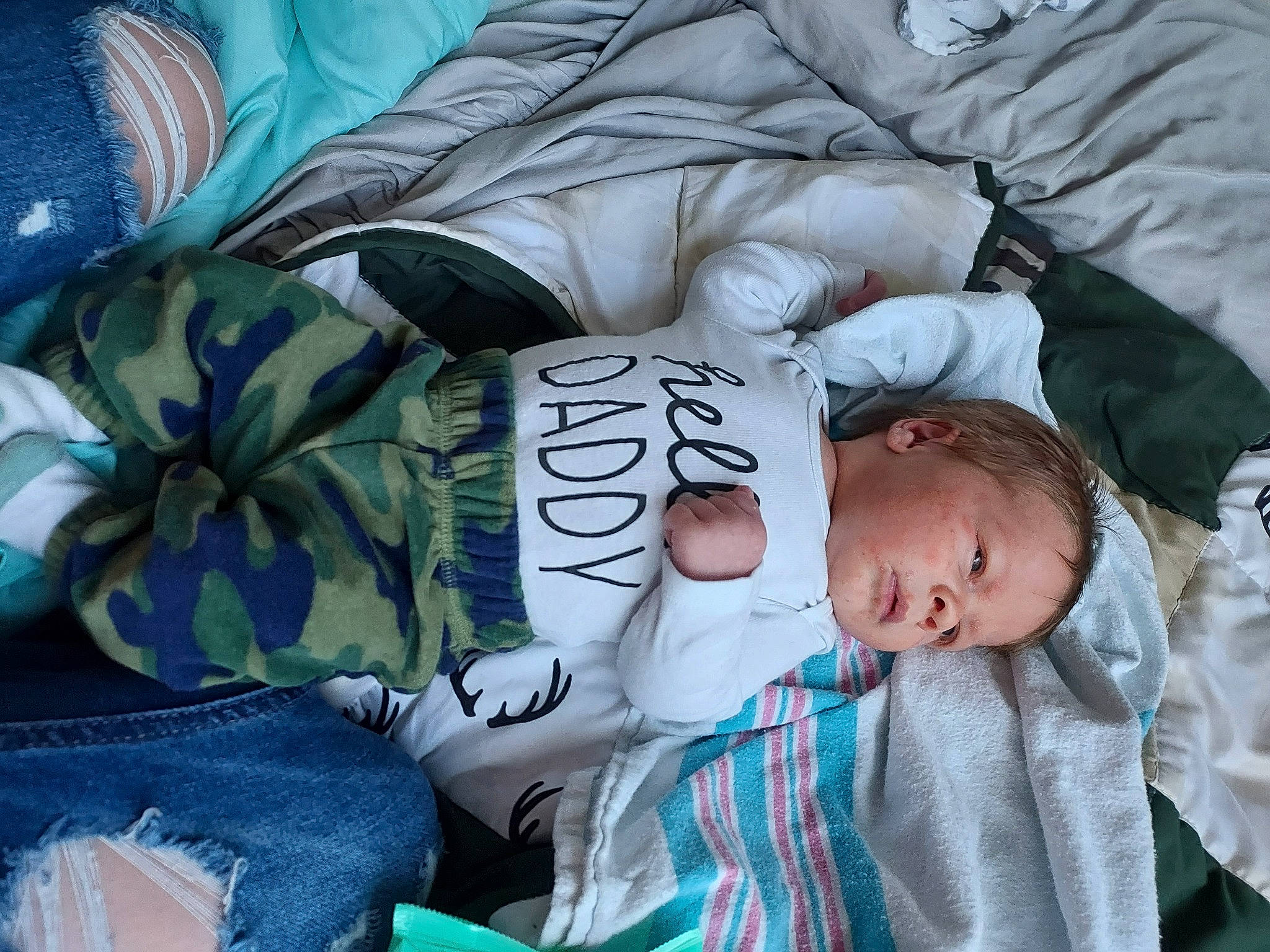 Kason joined the competition — help win amazing prizes! baby, baby_products, baby_toddler_clothing, bedtime, child, comfort, electric_blue, facial_expression, linens, nap, pattern, person, product, room, sitting, sleep, sleeve, textile, toddler