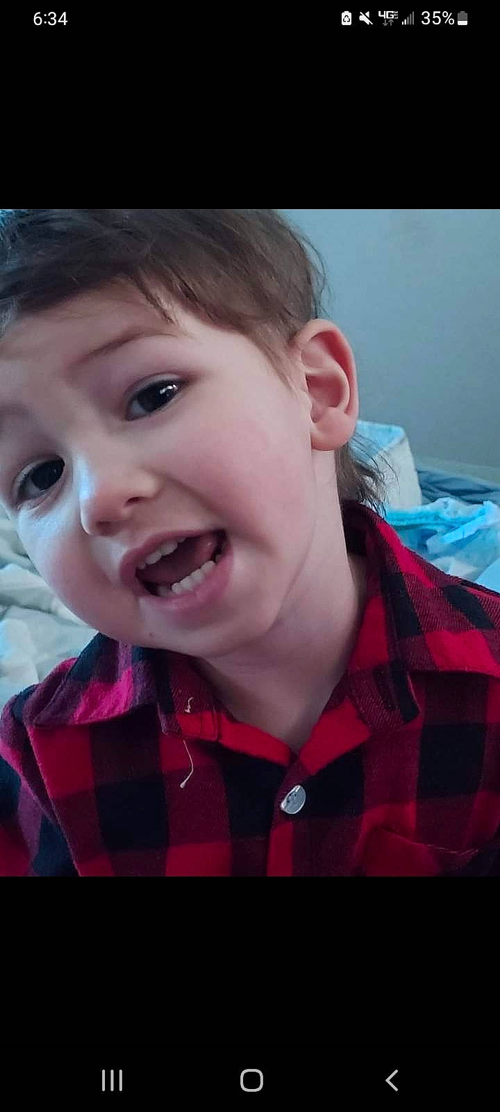 Karson joined the competition — help win amazing prizes! cheek, ear, eyelash, flash_photography, forehead, gesture, happy, human_body, iris, jaw, lip, mouth, nose, person, pink, skin, sleeve, smile, tartan, toddler