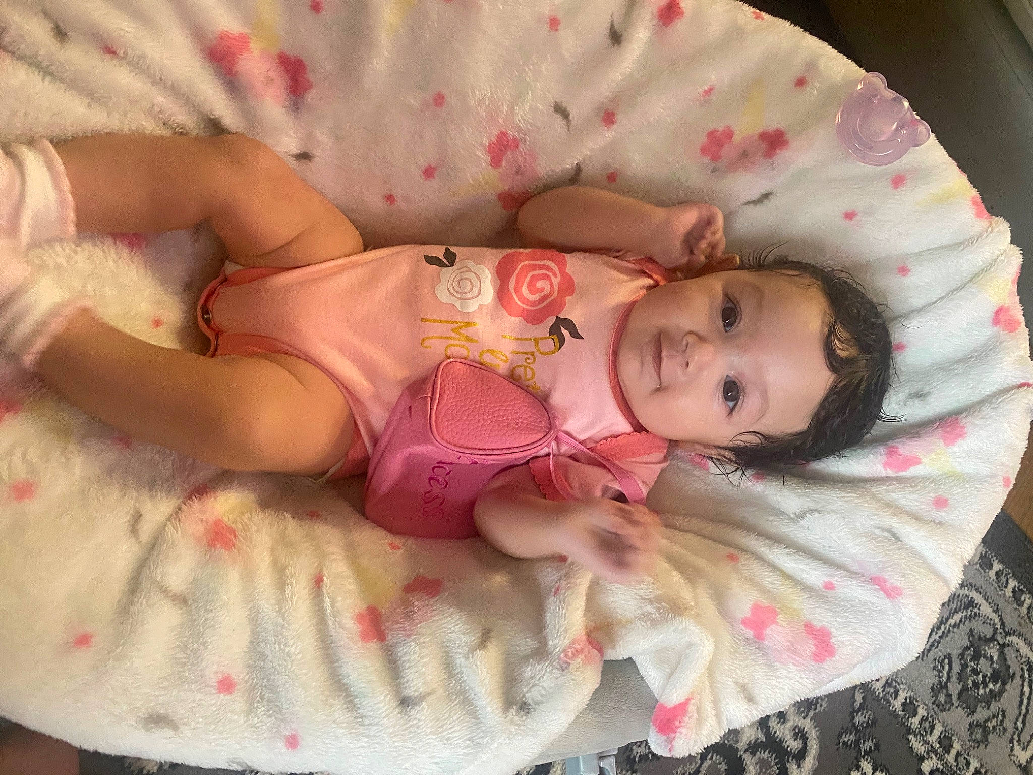 Riley Ray joined the competition — help win amazing prizes! baby, baby_products, baby_toddler_clothing, cheek, child, comfort, dress, eye, eyelash, head, headgear, human_body, pattern, person, pink, product, skin, sleeve, textile, toddler