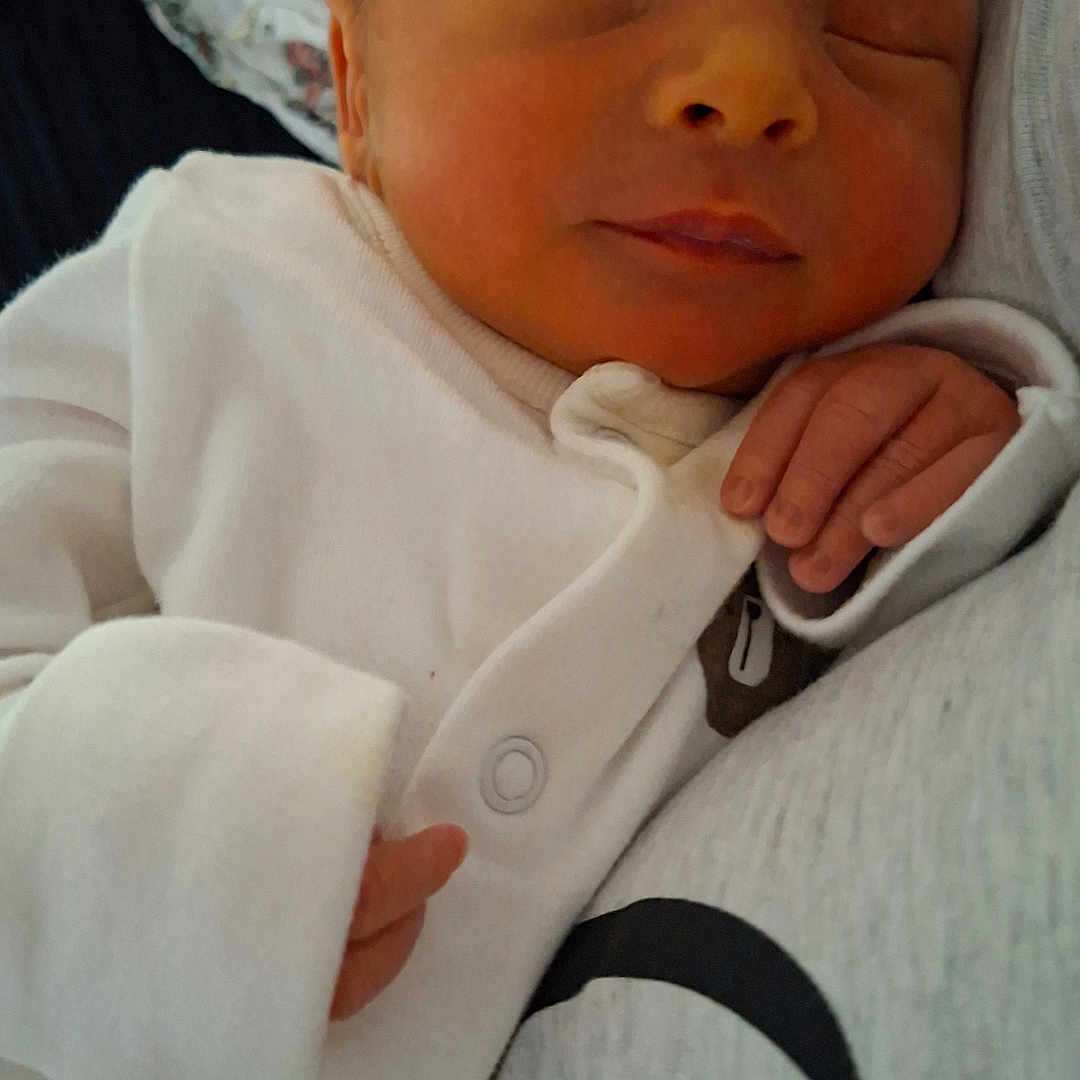 Robert joined the competition — help win amazing prizes! baby, closeup, clothing, comfort, cozy, cute, face, hand, human, infant, newborn, peaceful, person, portrait, resting, skin, sleeping, soft, tender, white_onesie