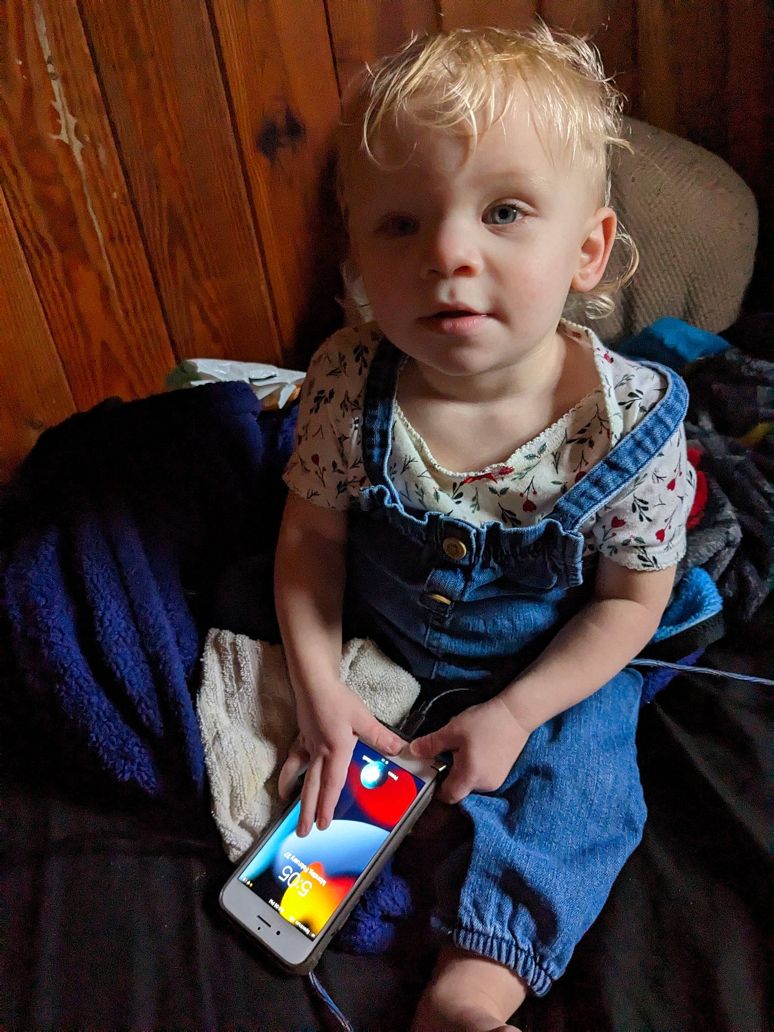 Amira is registered to the contest to win money with this photo: baby, baby_toddler_clothing, carmine, cheek, child, electric_blue, finger, fun, gadget, happy, head, iris, pattern, person, rubiks_cube, sitting, skin, sleeve, t_shirt, toddler