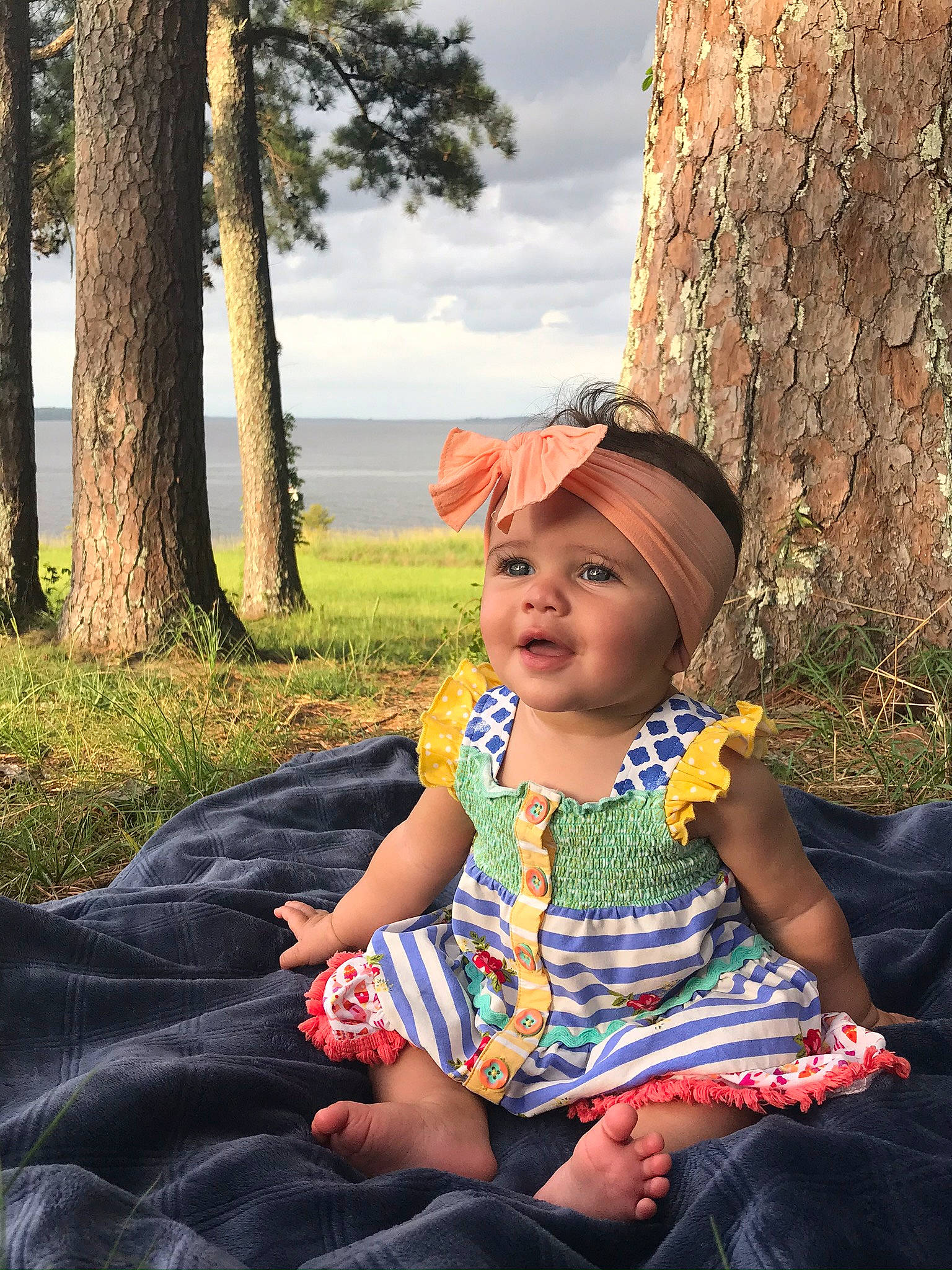 Carsyn joined the competition — help win amazing prizes! child, fawn, grass, happy, headwear, leaf, leisure, people, person, photography, plant, recreation, sitting, skin, smile, summer, toddler, tree, vacation