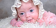 Xena joined the competition — help win amazing prizes! baby, infant, blue_eyes, lace_bonnet, pink_clothing, pearls, fluffy_blanket, close_up, cute, resting, portrait, soft_texture, child, face, smile, newborn, adorable, innocence, cute_expression, cozy