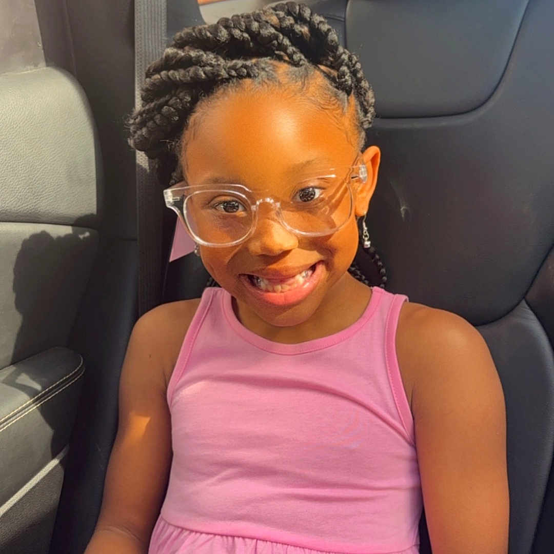 Heaven is registered to the contest to win money with this photo: accessories, child, cushion, earring, electronics, face, female, girl, glasses, happy, head, homedecor, jewelry, mobilephone, person, phone, photography, portrait, sitting, smile