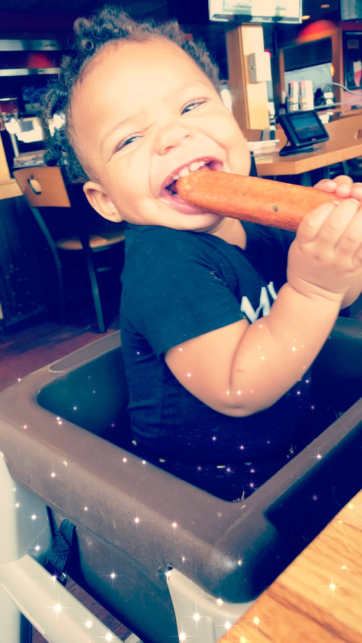 Lola is registered to the contest to win money with this photo: arm, baby, child, facial_expression, food, fun, mouth, person, smile, toddler