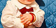 Luka Vucic participe au concours pour gagner de l'argent avec cette photo : apparel, baby, blue_background, bow_tie, cheerful, child, clapping_hands, closeup, cute, fashion, happy, indoors, infant, portrait, red_hat, red_pants, sitting, smiling, white_shirt, white_shoes