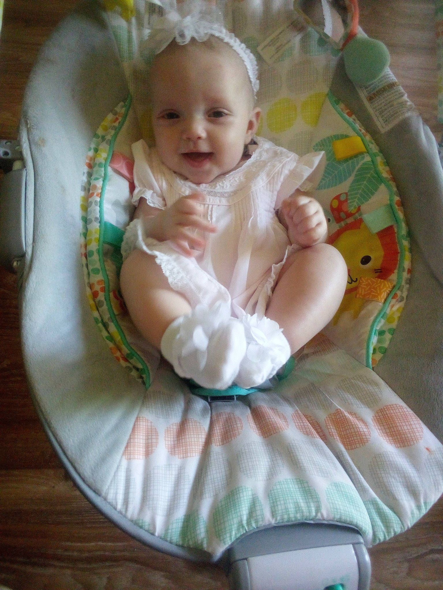 Arianna is registered to the contest to win money with this photo: baby, baby_products, baby_toddler_clothing, chair, cheek, child, comfort, dishware, dress, event, eye, fashion_accessory, happy, jewellery, person, pink, sitting, skin, sleeve, smile