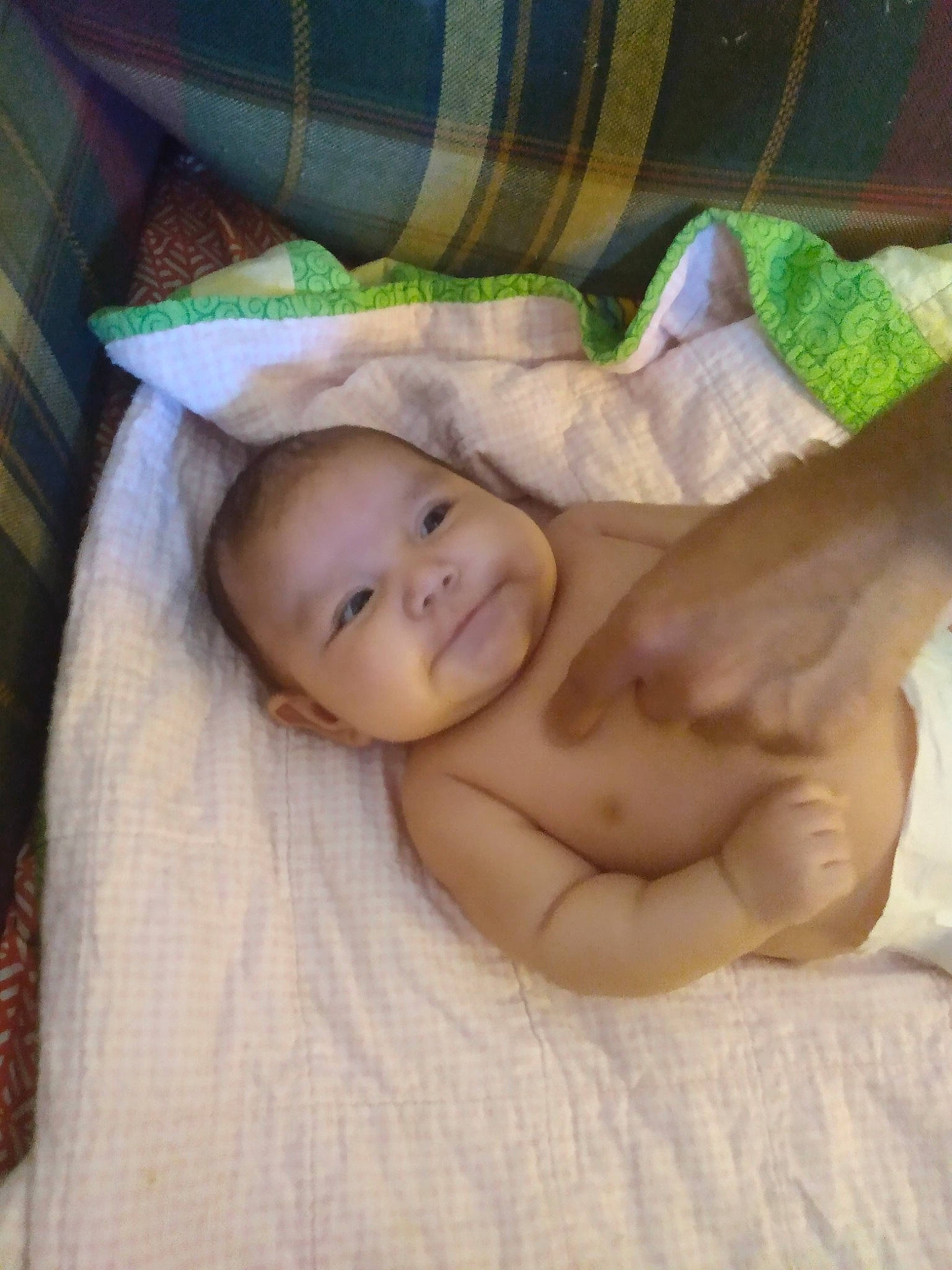 Jenna is registered to the contest to win money with this photo: baby, baby_products, baby_safety, baby_sleeping, baby_toddler_clothing, bedding, bedtime, blanket, cheek, chest, child, comfort, infant_bed, linens, nap, pattern, person, sleep, smile, thumb