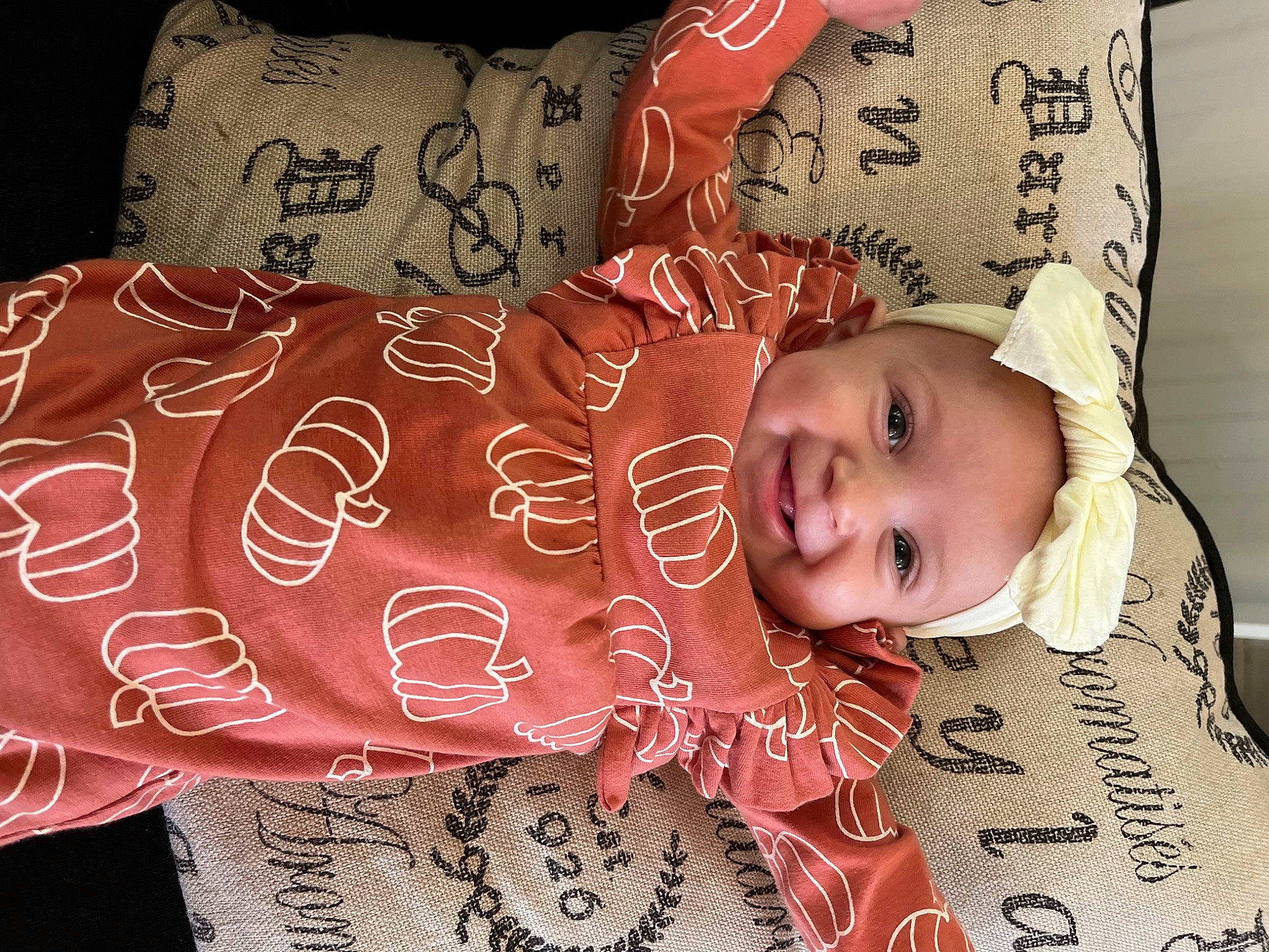 Astrid is registered to the contest to win money with this photo: art, baby, baby_toddler_clothing, cheek, child, design, event, font, happy, hat, head, headgear, linens, pattern, person, pink, product, sleeve, smile, textile