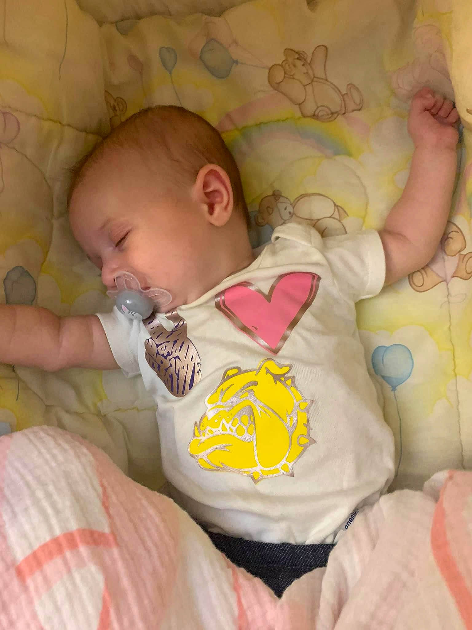 Astrid is registered to the contest to win money with this photo: arm, baby, baby_products, baby_sleeping, baby_toddler_clothing, cheek, comfort, eye, facial_expression, finger, head, linens, mouth, nose, orange, person, product, skin, sleeve, textile