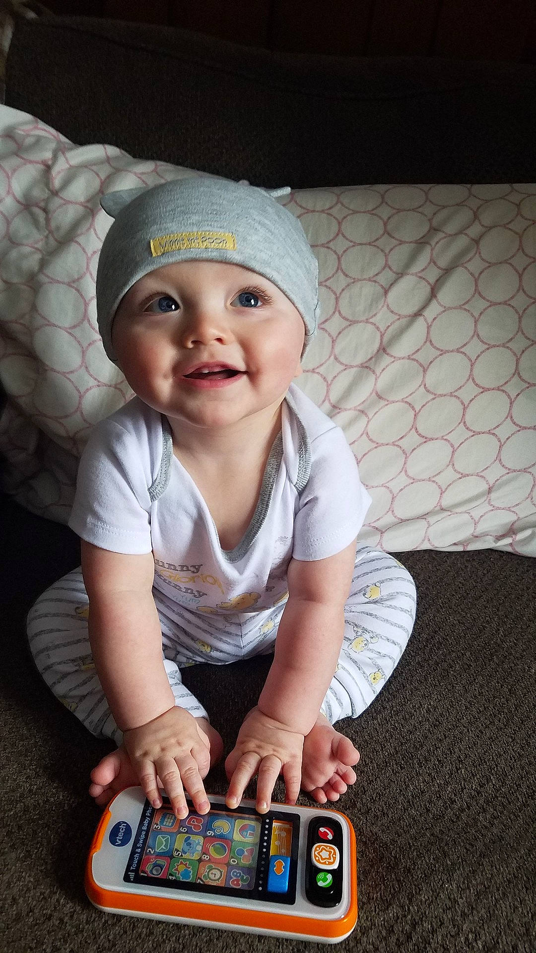 Kellan is registered to the contest to win money with this photo: boy, cap, child, cool, day, eye, fun, girl, headgear, infant, person, play, product, sitting, skin, smile, snapshot, toddler