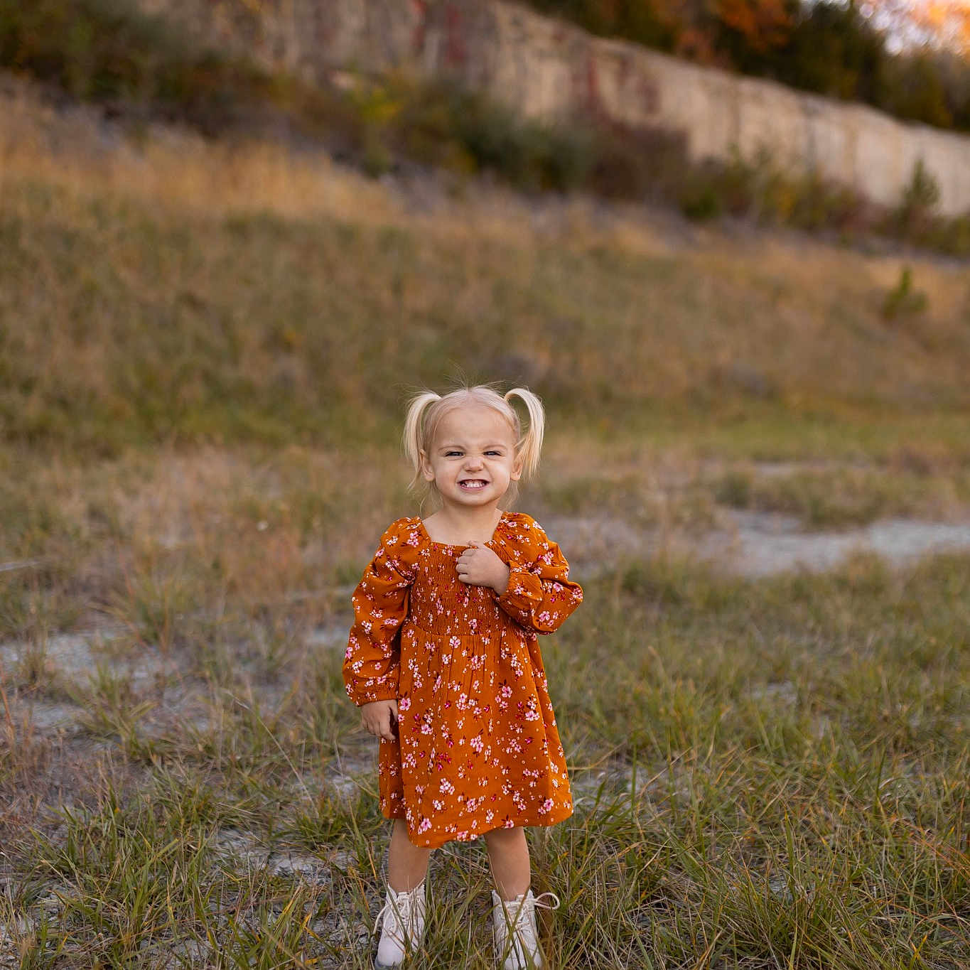 Alaina is registered to the contest to win money with this photo: child, fawn, field, grass, grassland, happy, landscape, meadow, natural_landscape, pattern, people_in_nature, plant, prairie, sky, smile, soil, spring, toddler, tree, wood