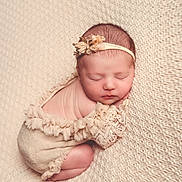 Hailey participe au concours pour gagner de l'argent avec cette photo : accessories, baby, blanket, bodypart, bonnet, clothing, dress, face, finger, glove, hand, happy, hat, head, newborn, person, photography, portrait, sleeping, smile