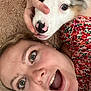 Oréo participe au concours pour gagner de l'argent avec cette photo : affection, animal, casual, closeup, colorful_clothing, dog, expression, face, hand, happy, human, indoor, lying_down, nose, pet, playful, portrait, smiling, texture, woman