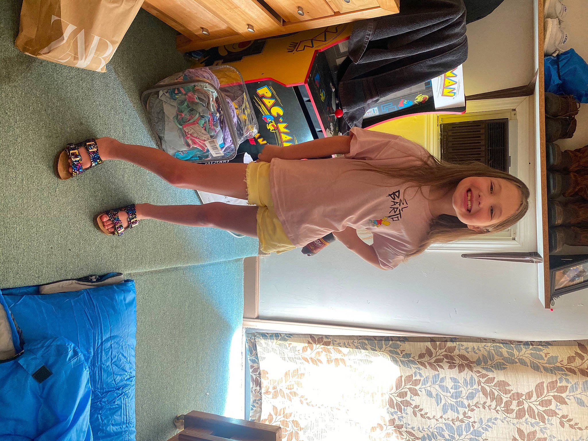 Piper joined the competition — help win amazing prizes! blue, flooring, fun, hardwood, hat, human_leg, joy, leisure, person, room, shelving, shorts, smile, t_shirt, tire, wood