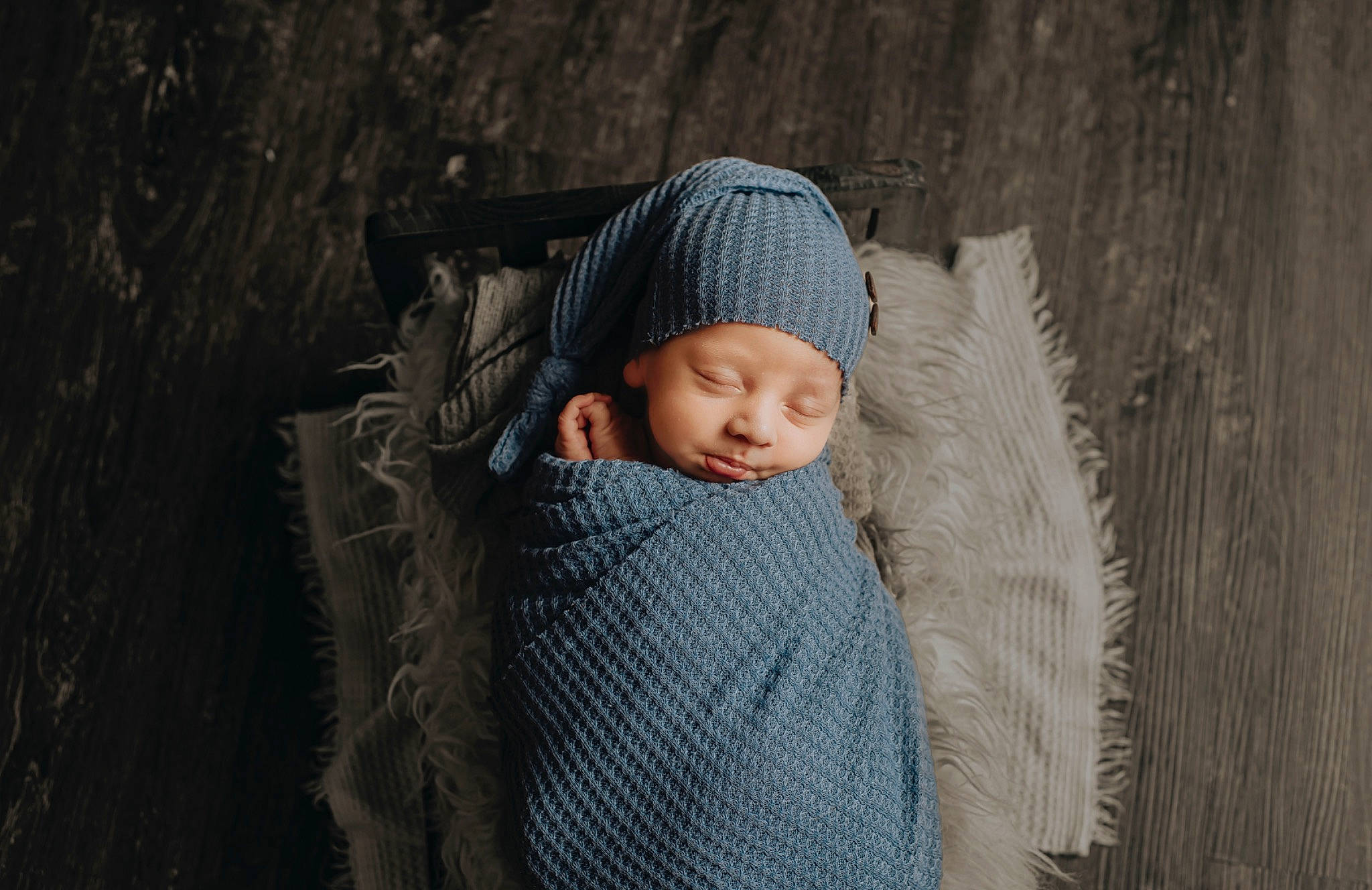 Raiden joined the competition — help win amazing prizes! baby, baby_toddler_clothing, beanie, cap, child, comfort, flash_photography, grass, grey, headgear, headwear, knit_cap, pattern, person, sitting, sleeve, toddler, tree, winter, wood