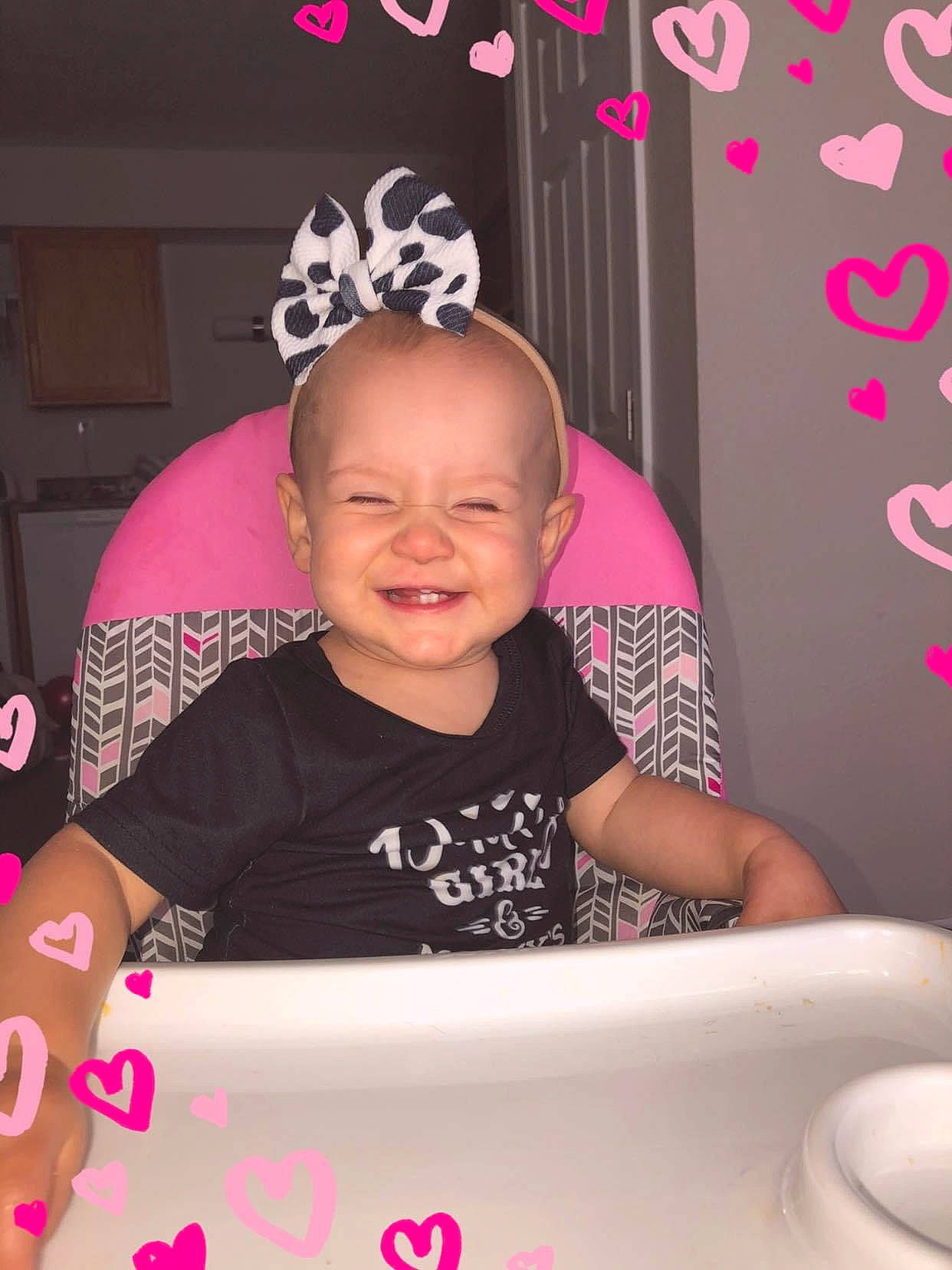 Delilah joined the competition — help win amazing prizes! baby, baby_toddler_clothing, cheek, child, face, font, fun, happy, humour, joy, logo, magenta, pattern, person, pink, product, purple, sitting, sleeve, smile