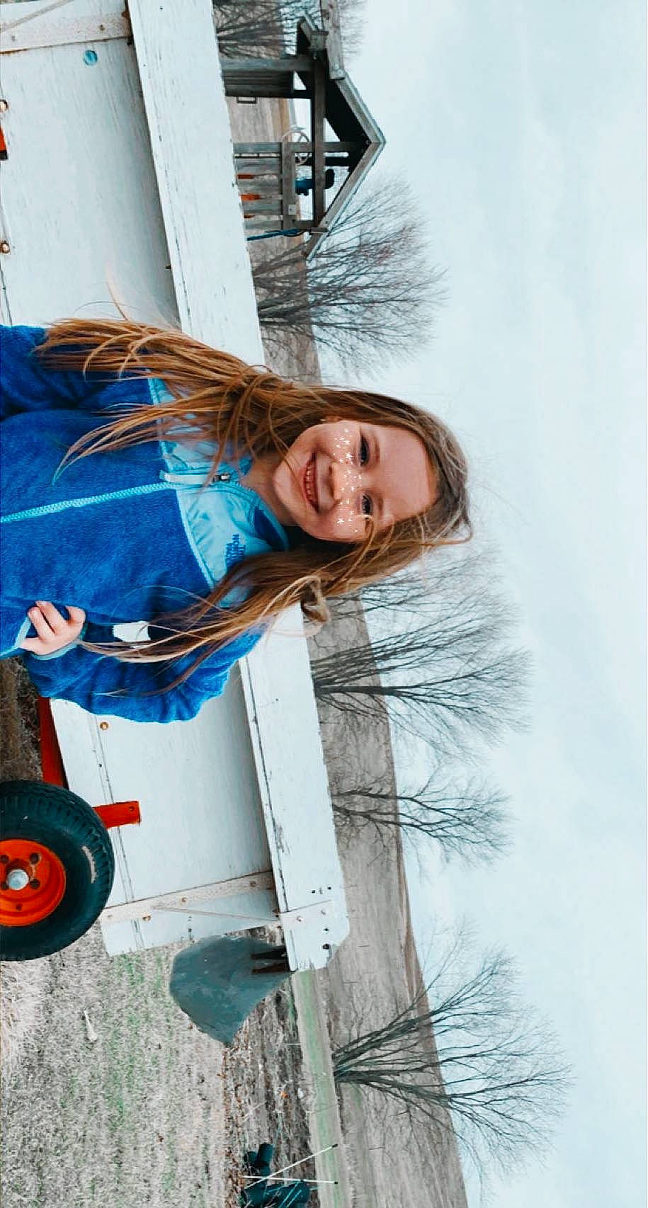 Tenley is registered to the contest to win money with this photo: adventure, automotive_tire, electric_blue, flash_photography, freezing, fun, fur, happy, joy, leisure, person, recreation, sky, smile, tire, tree, vacation, water, wheel, window