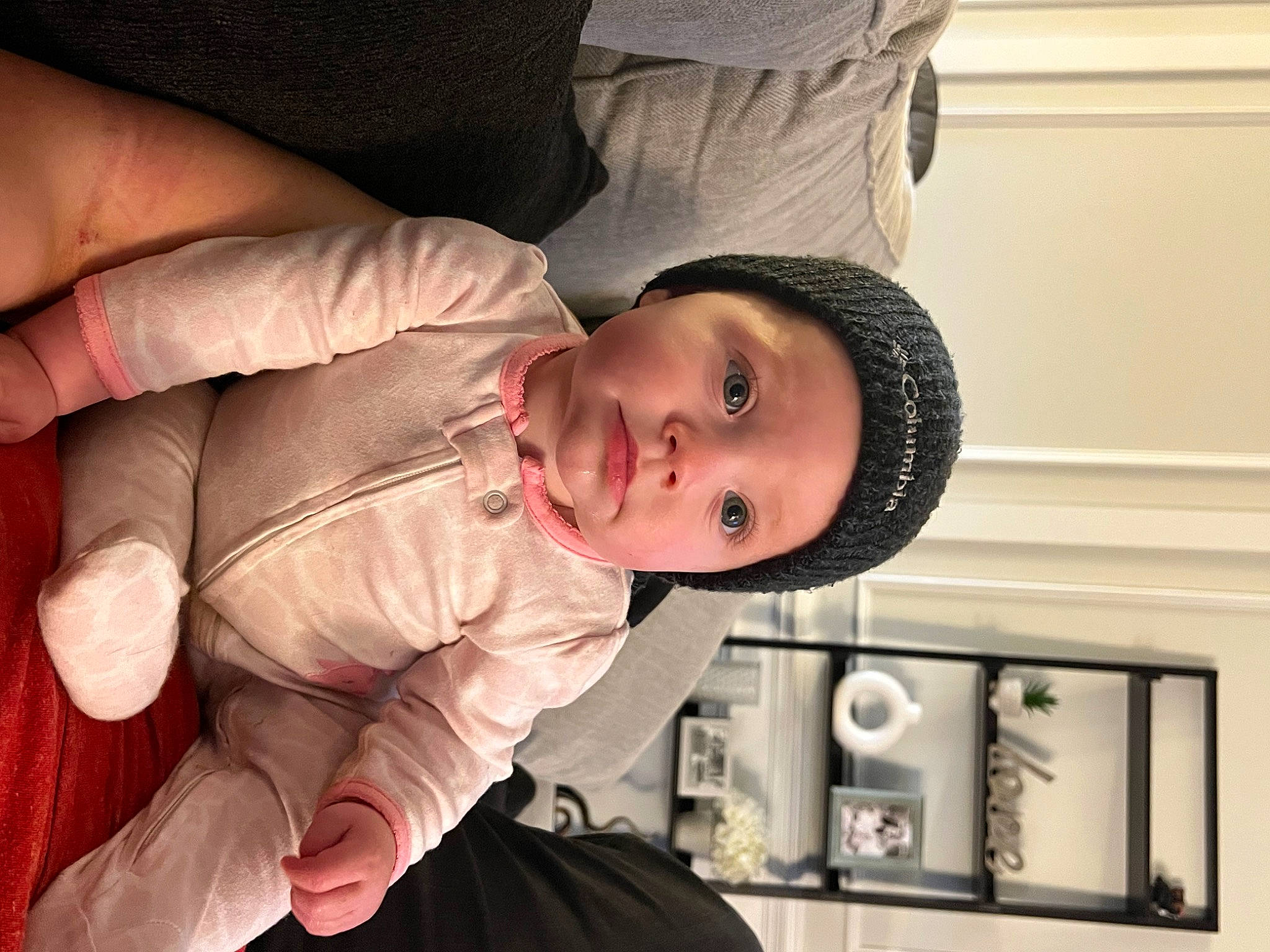 Kennedi is registered to the contest to win money with this photo: baby, baby_toddler_clothing, cheek, child, comfort, ear, eye, finger, gesture, happy, hat, headwear, human_body, lip, mouth, nose, person, skin, sleeve, smile