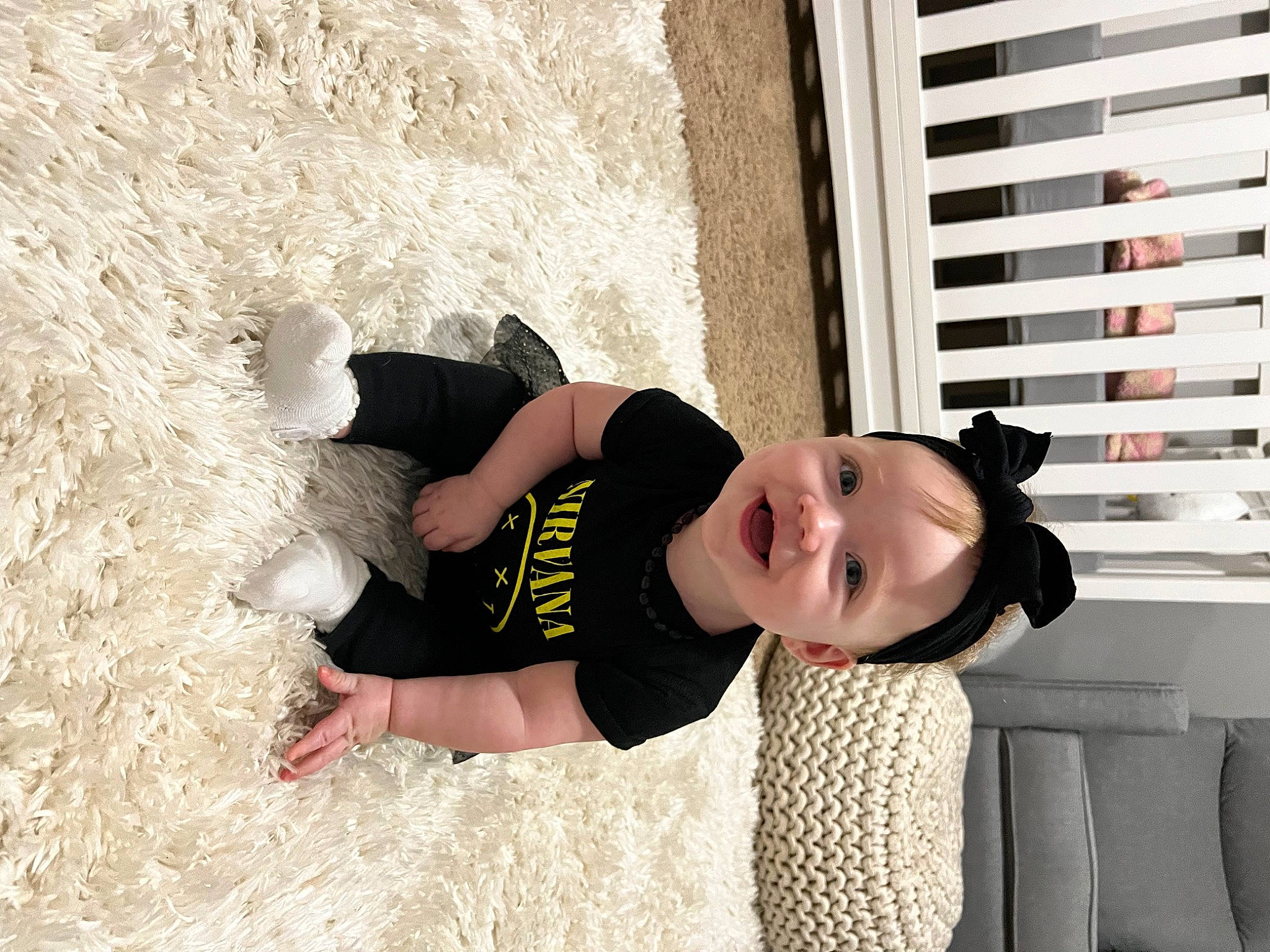 Kennedi is registered to the contest to win money with this photo: baby, baby_toddler_clothing, child, dress, eyewear, flash_photography, flooring, fun, grass, happy, human_leg, knee, person, room, sitting, t_shirt, thigh, toddler, waist, window