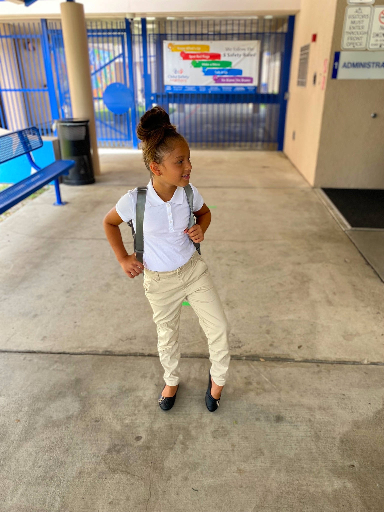 Jenelle is registered to the contest to win money with this photo: asphalt, baby, bag, child, city, floor, flooring, fun, happy, joy, leisure, luggage_and_bags, pedestrian, person, play, recreation, room, sidewalk, sitting, t_shirt