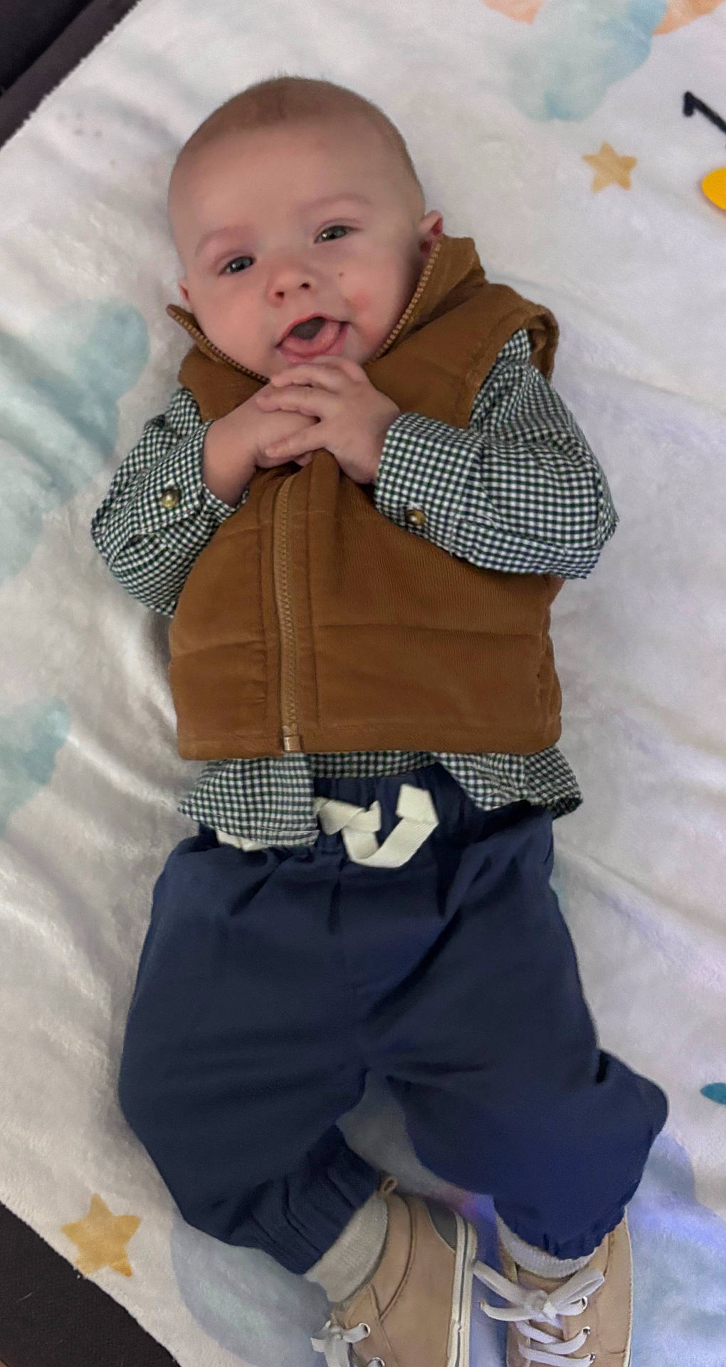 Waylen joined the competition — help win amazing prizes! baby, bodypart, clothing, coat, face, finger, footwear, hand, head, jacket, jeans, knitwear, pants, person, photography, portrait, shoe, shorts, sitting, sweater