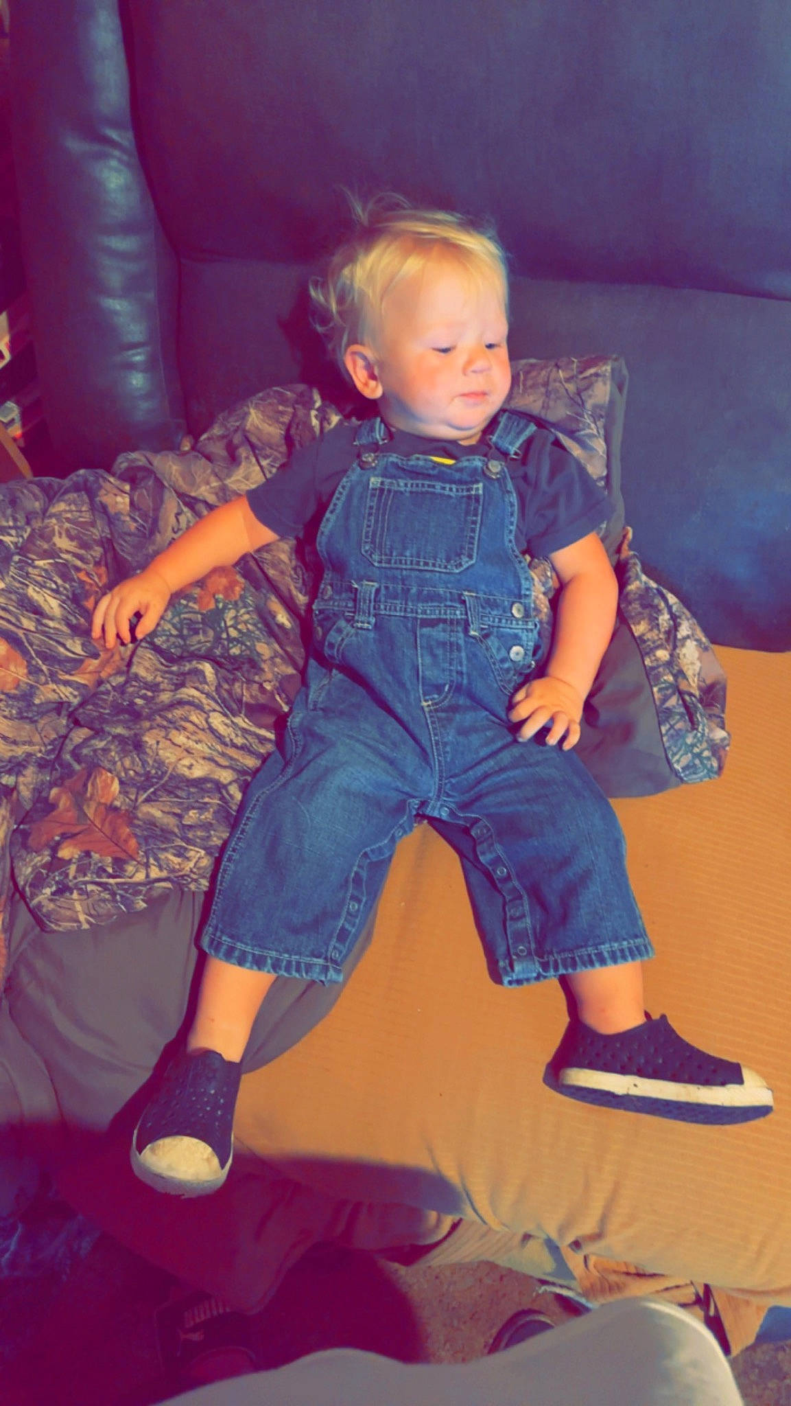 Jaymeson is registered to the contest to win money with this photo: baby_toddler_clothing, child, comfort, electric_blue, face, flash_photography, foot, fun, happy, head, human_body, human_leg, lap, leisure, magenta, person, pink, purple, sitting, thigh