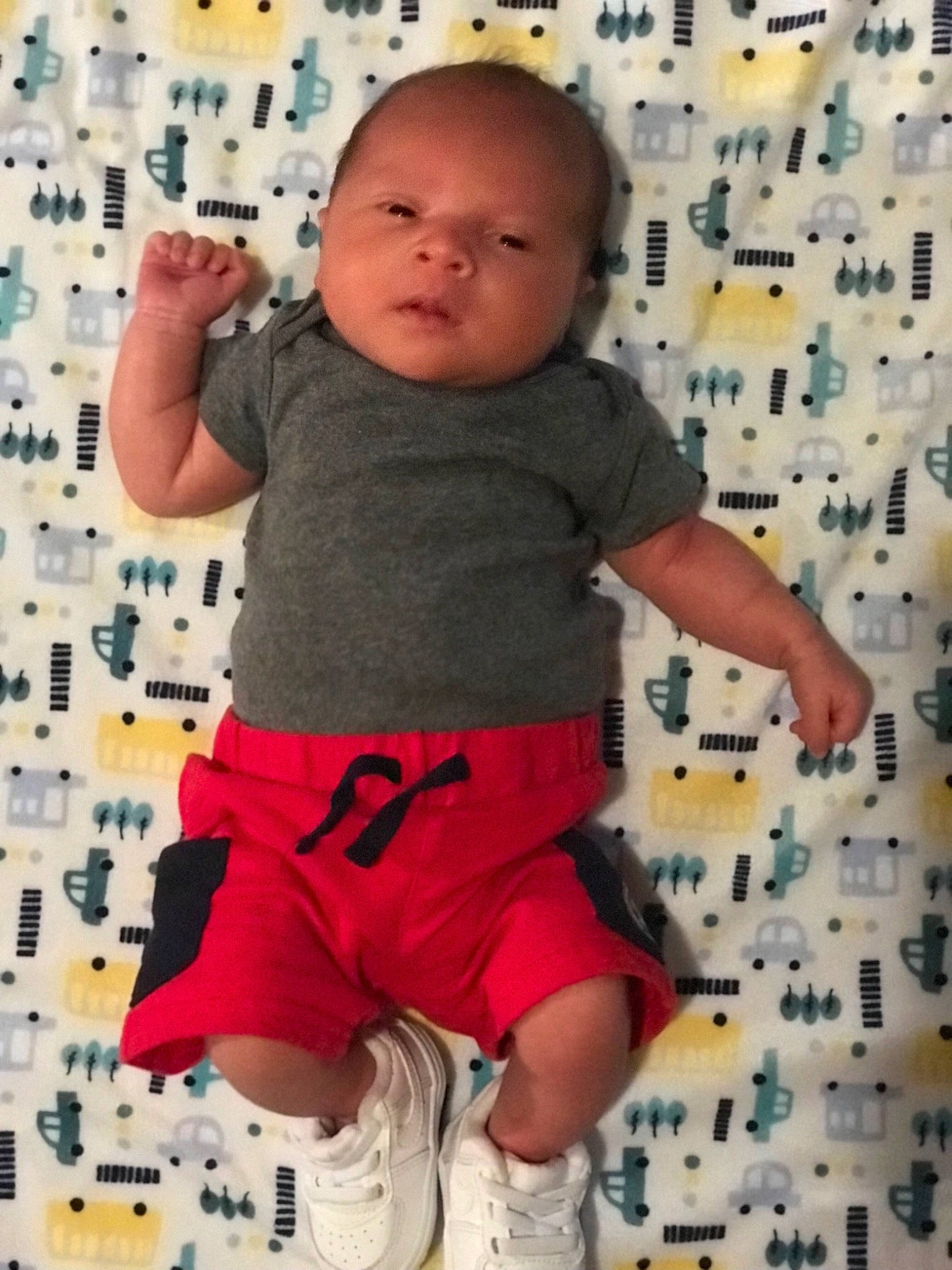 Marlo joined the competition — help win amazing prizes! arm, baby, baby_toddler_clothing, facial_expression, gesture, hand, happy, head, human, human_body, joint, leg, orange, person, product, shorts, shoulder, sleeve, standing, t_shirt