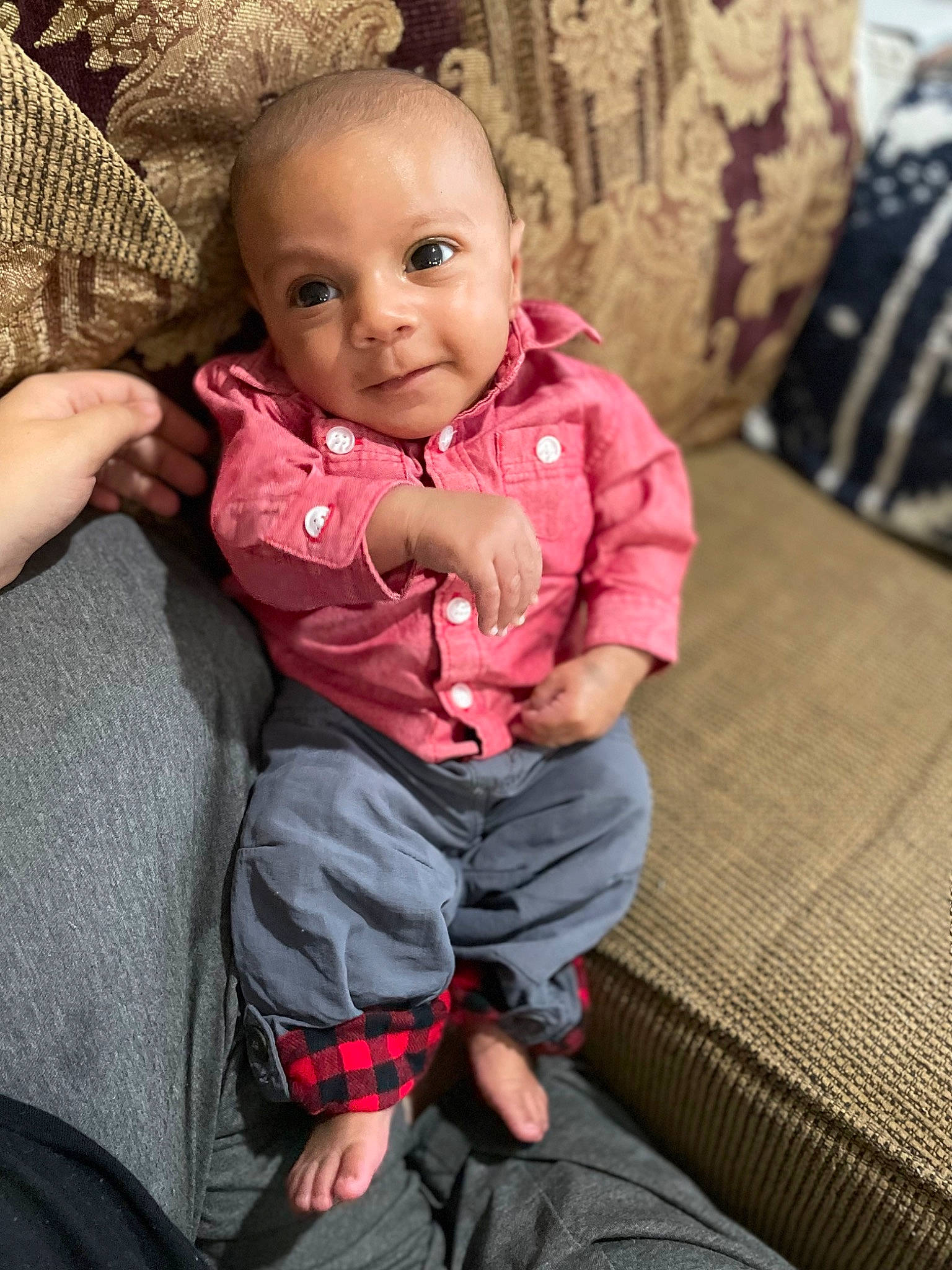 Ethan is registered to the contest to win money with this photo: baby, baby_toddler_clothing, cheek, chin, comfort, eye, facial_expression, finger, hand, head, iris, joy, leg, lip, mouth, nose, person, skin, sleeve, standing