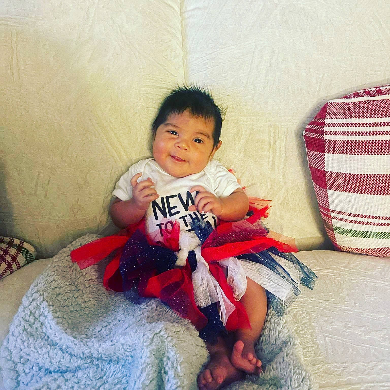 Amira is registered to the contest to win money with this photo: baby, baby_toddler_clothing, comfort, cool, elbow, eye, face, floor, hairstyle, happy, human, human_body, leg, person, shoulder, skin, sleeve, smile, thigh, tints_and_shades