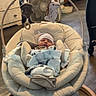 newborn, baby, infant, sleeping, face, portrait, rocker, baby_gear, blanket, swaddled, hat, toy, dinosaur, nursery, indoor, home, fan, furniture, wood_floor, cozy