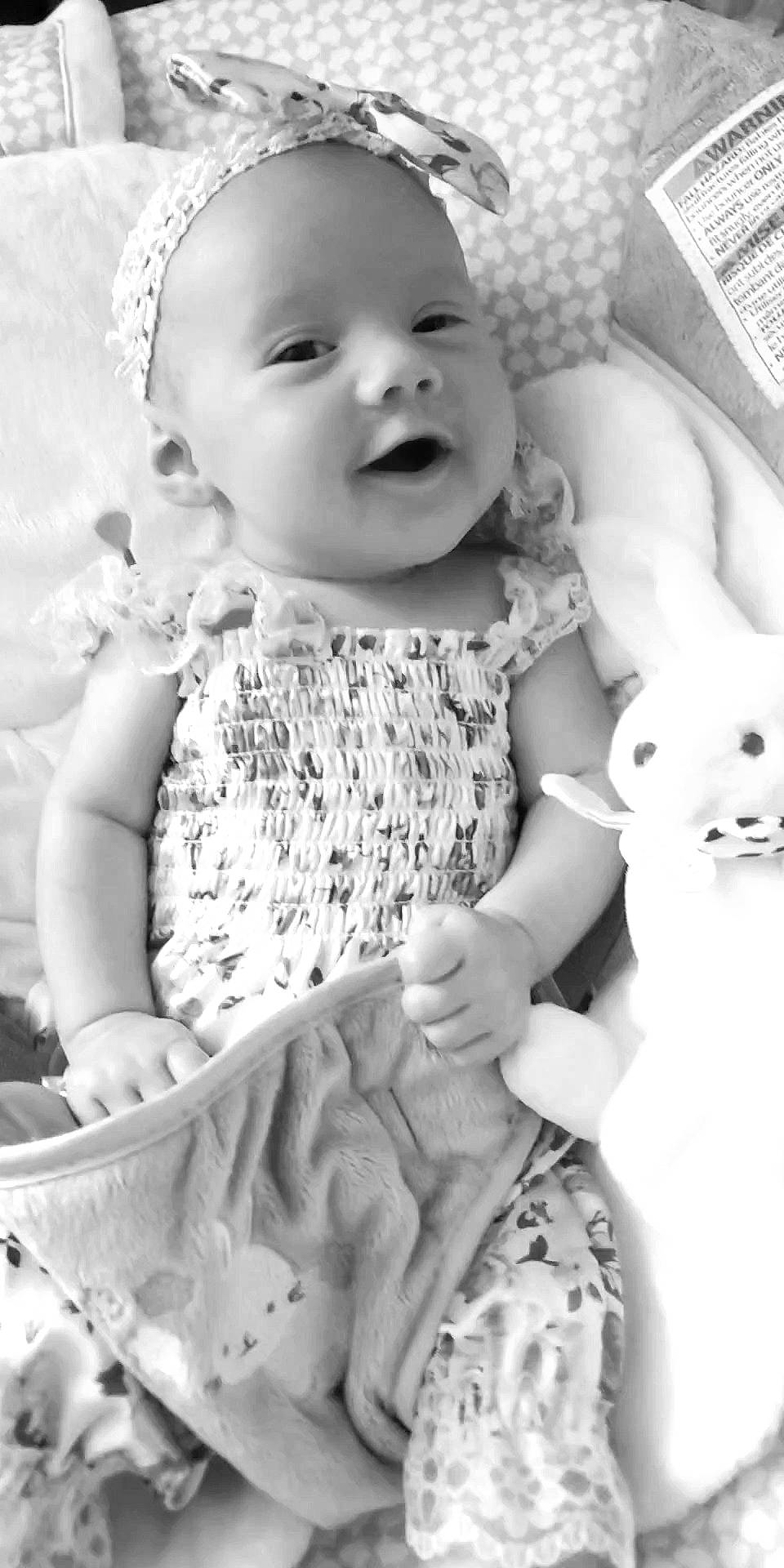 Ashley participe au concours pour gagner de l'argent avec cette photo : arm, baby, baby_toddler_clothing, black, eye, face, facial_expression, hairstyle, happy, head, human, iris, organ, person, photograph, product, skin, sleeve, smile, standing