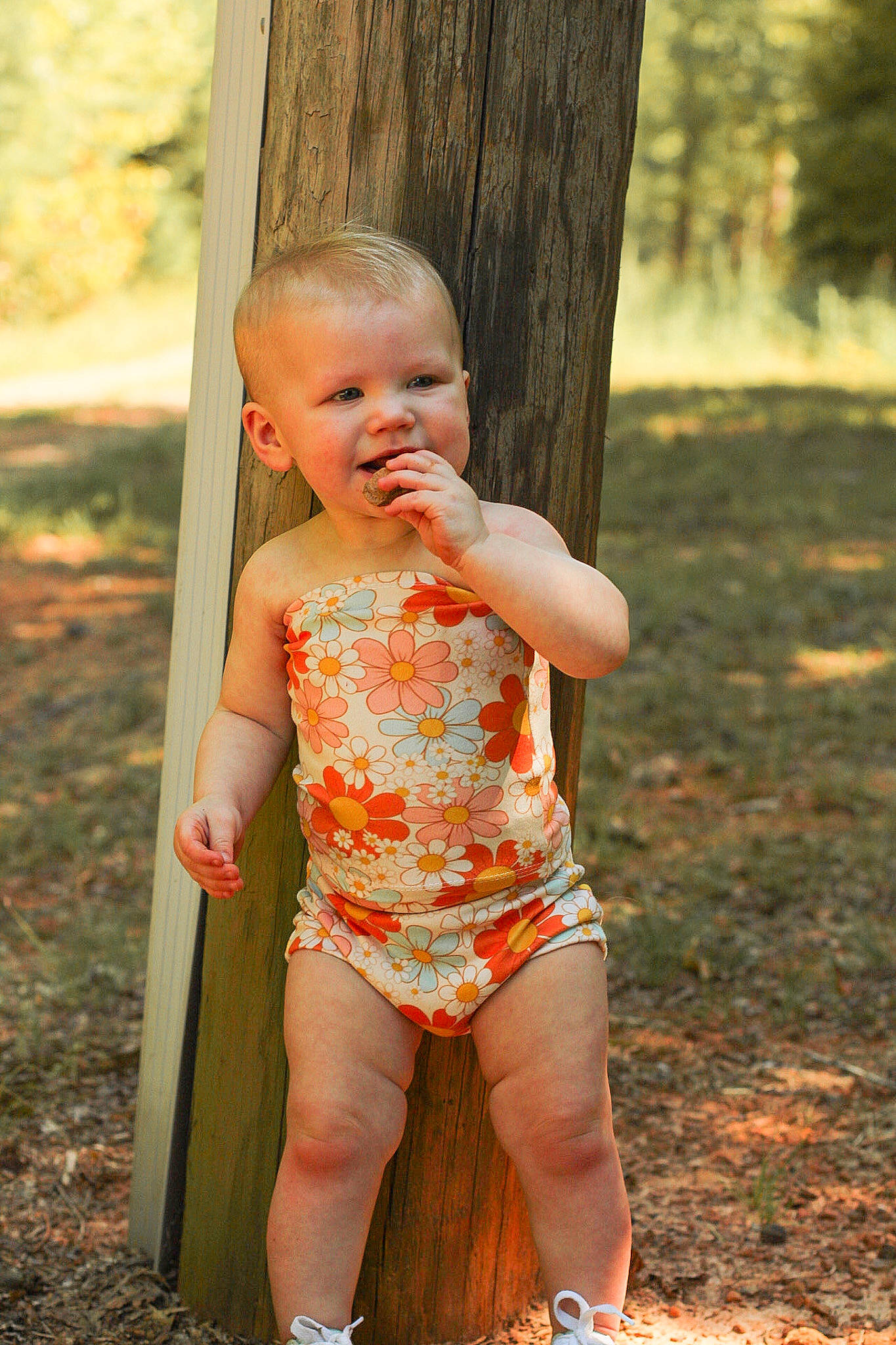 Luella joined the competition — help win amazing prizes! baby, baby_toddler_clothing, fun, grass, happy, human_leg, leaf, leisure, people_in_nature, person, plant, recreation, sitting, smile, summer, thigh, toddler, tree, trunk, waist