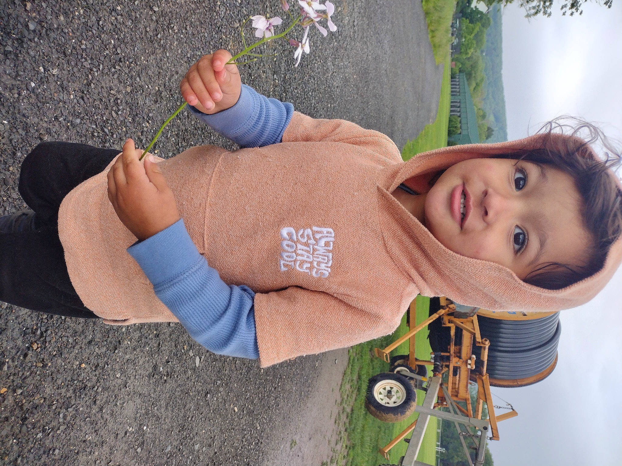 Neven joined the competition — help win amazing prizes! child, denim, electric_blue, fun, grass, happy, human_leg, knee, leisure, pattern, people_in_nature, person, plant, sitting, sky, smile, thigh, tire, toddler, tree