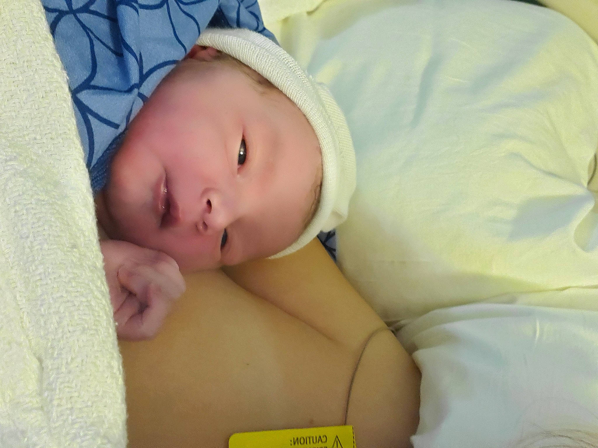 Aubrey is registered to the contest to win money with this photo: baby, baby_products, baby_sleeping, baby_toddler_clothing, bedtime, cheek, child, comfort, eye, eyebrow, eyelash, hat, iris, linens, lip, pattern, person, portrait_photography, room, sleep