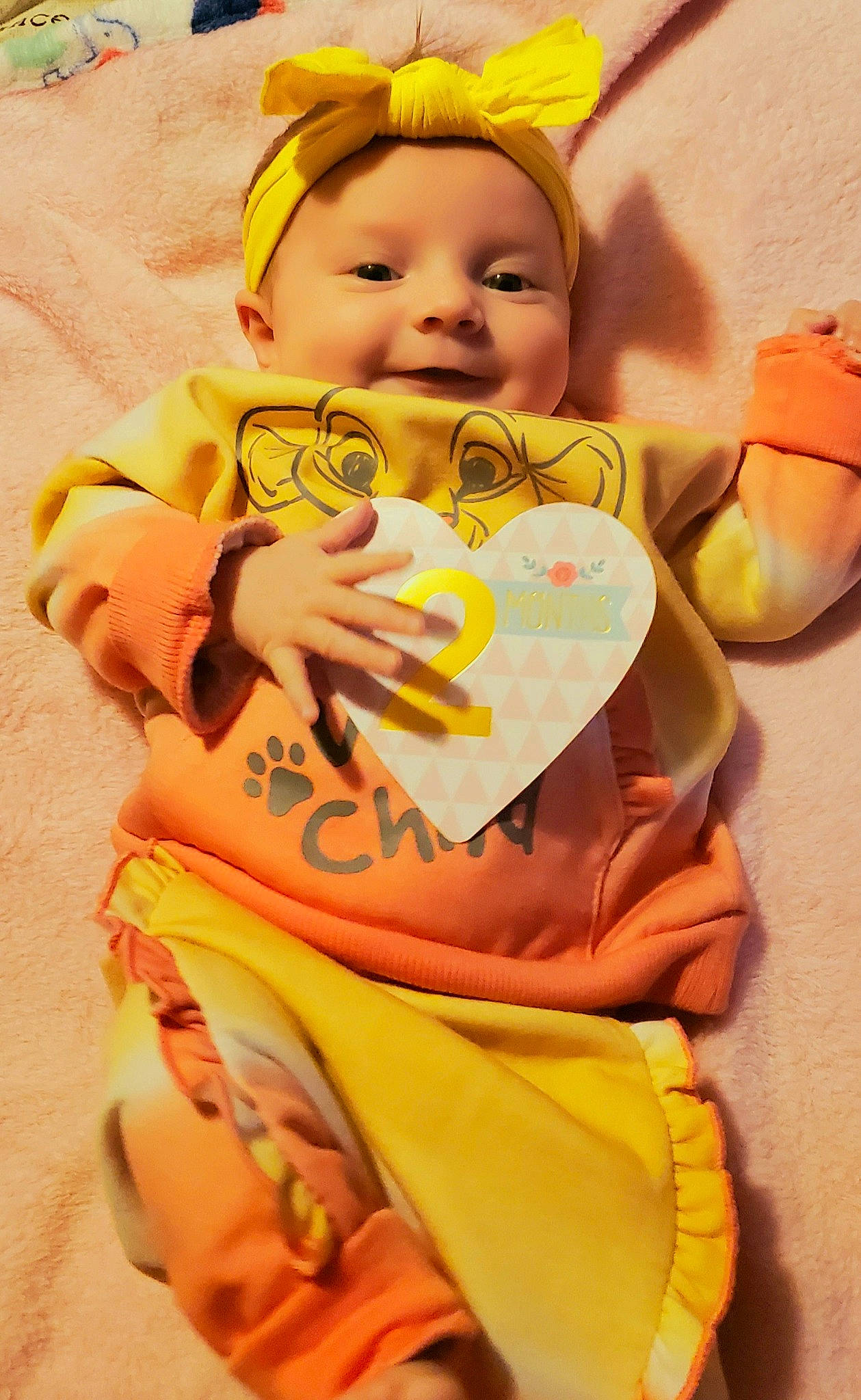 Aubrey joined the competition — help win amazing prizes! animation, baby, baby_products, baby_toddler_clothing, cheek, child, doll, eye, fashion_design, fun, happy, head, linens, orange, peach, person, skin, stuffed_toy, toddler, toy