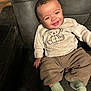 Kyael is registered to the contest to win money with this photo: baby, casual, chair, child, clothing, comfort, cozy, cute, face, happy, indoor, infant, leather, portrait, relaxed, sitting, smile, socks, teddy_bear, young_child