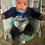 Kyael joined the competition — help win amazing prizes! baby, infant, child, baby_rocker, clothing, socks, sweater, face, eyes, expression, indoor, carpet, seat, comfort, cute, adorable, looking_up, curious, person, home
