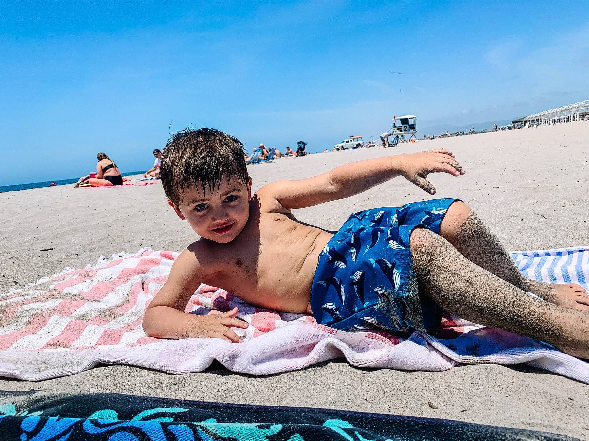 Johnathan is registered to the contest to win money with this photo: barechested, beach, cool, fun, joy, leg, leisure, linens, muscle, ocean, people_on_beach, person, sand, sea, shorts, summer, sun_tanning, sunlight, tourism, trunks