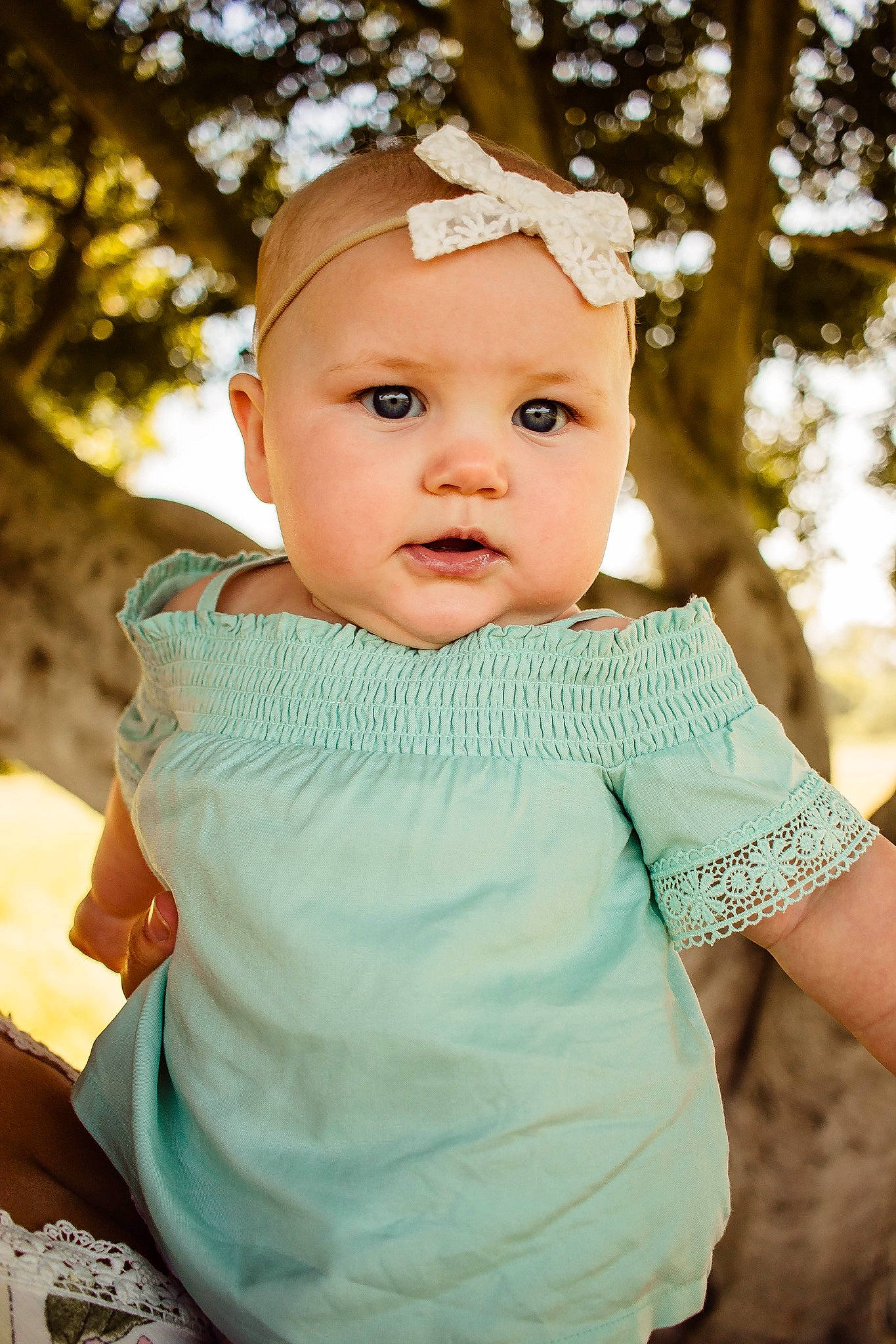 Ainsley joined the competition — help win amazing prizes! baby, cheek, child, dress, eye, face, grass, green, head, headgear, headwear, lip, people, person, photograph, photography, pink, skin, smile, toddler
