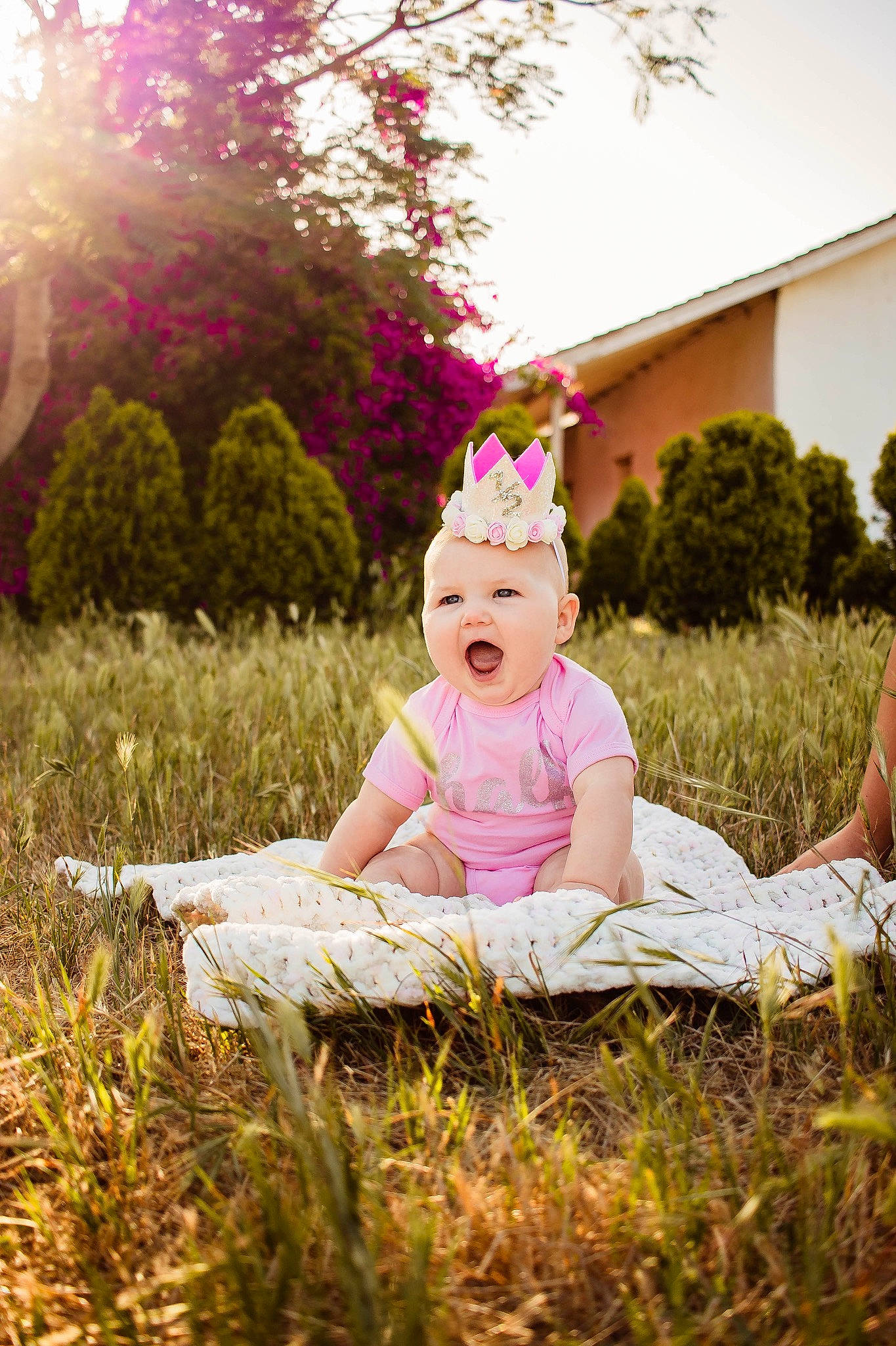 Ainsley is registered to the contest to win money with this photo: baby, beauty, child, eye, grass, grass_family, green, happy, headwear, meadow, people, people_in_nature, person, photograph, photography, pink, portrait, sitting, skin, spring