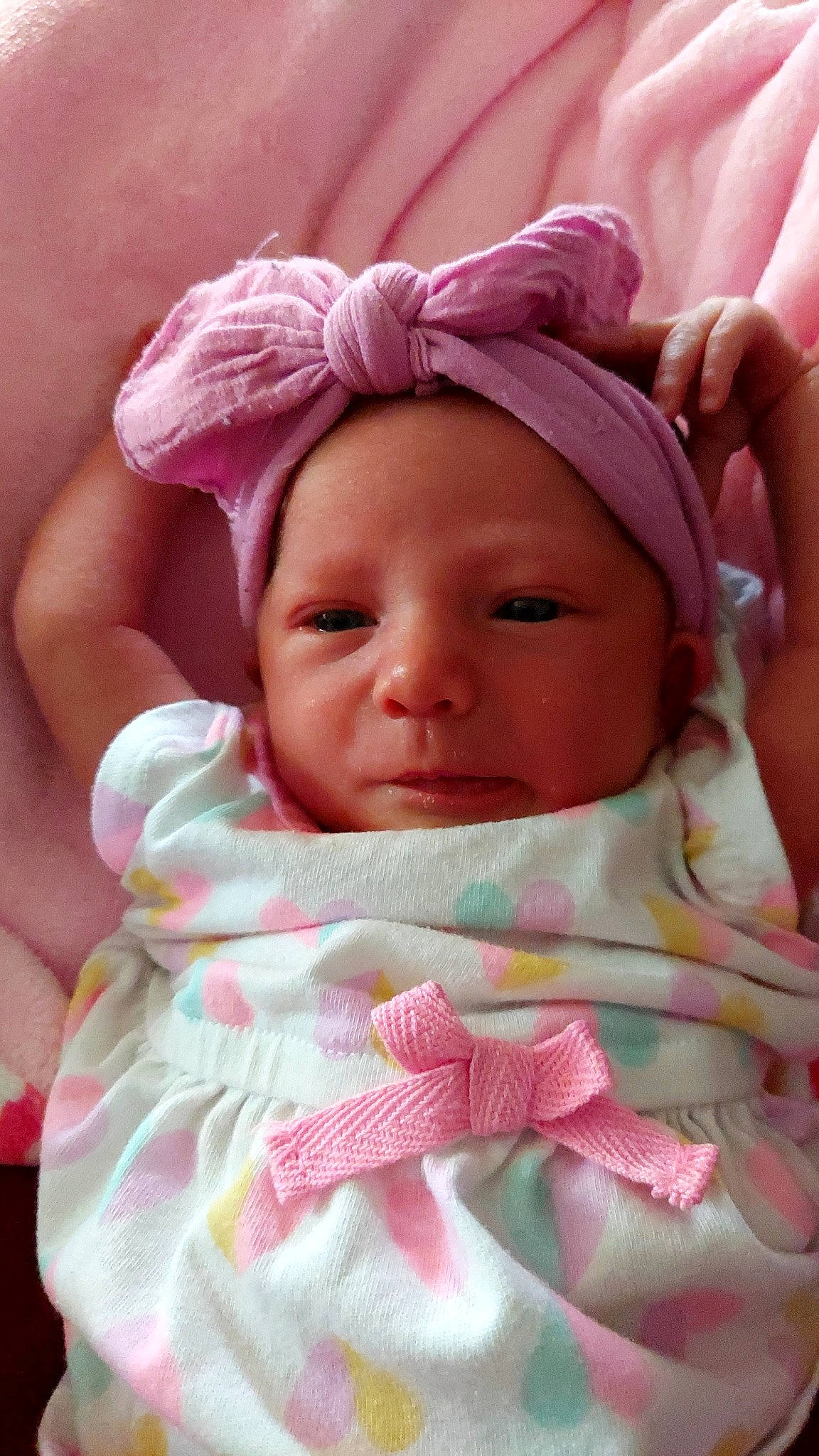 Chloe Leeann Scott is registered to the contest to win money with this photo: baby, baby_toddler_clothing, cheek, child, comfort, eyebrow, finger, happy, headwear, linens, lip, magenta, mouth, nose, person, pink, product, skin, textile, thumb