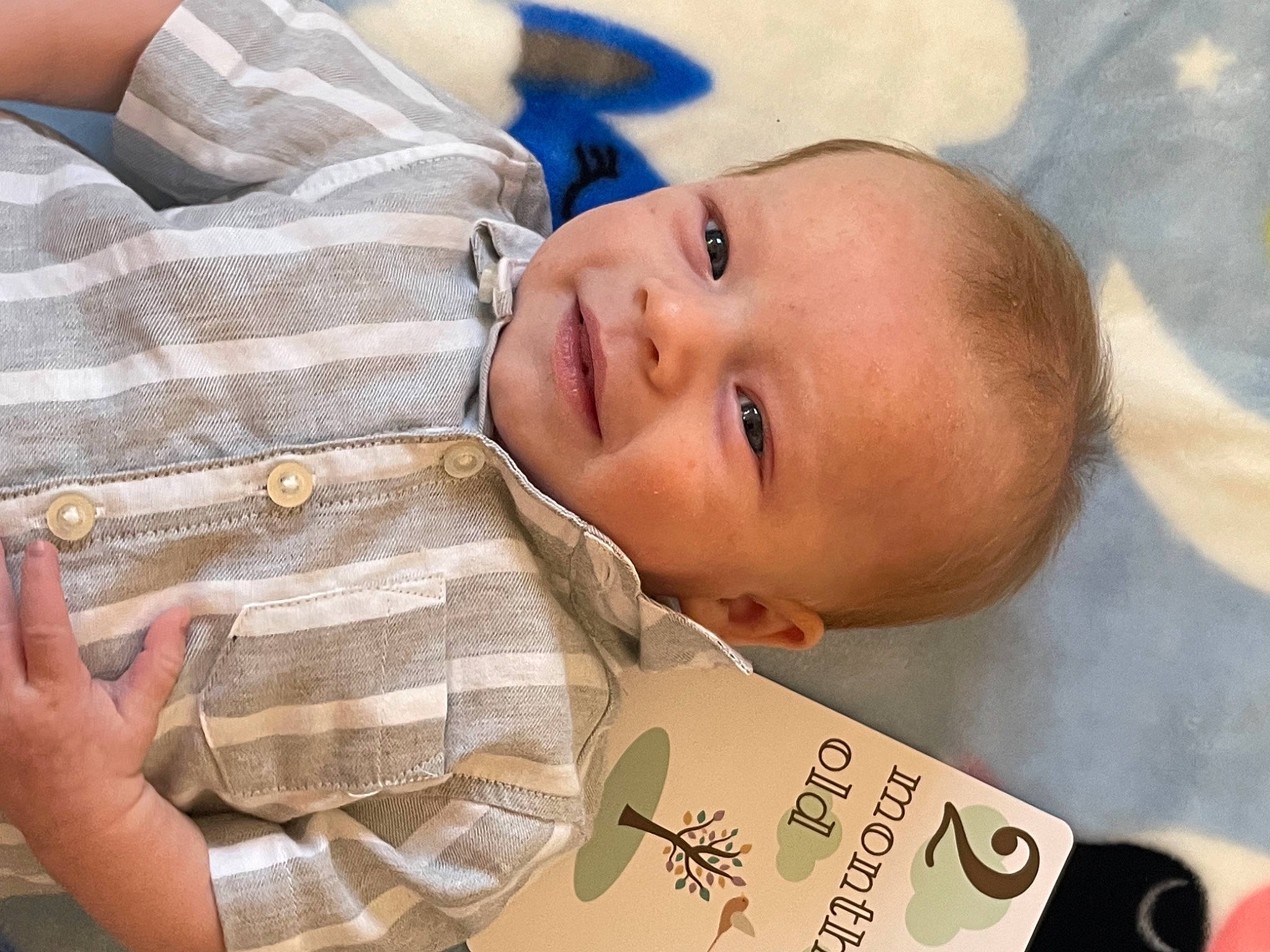 Albi joined the competition — help win amazing prizes! baby, baby_toddler_clothing, cheek, child, comfort, dress_shirt, eyelash, finger, gesture, grass, hand, happy, lip, nail, nose, pattern, person, skin, smile, thumb