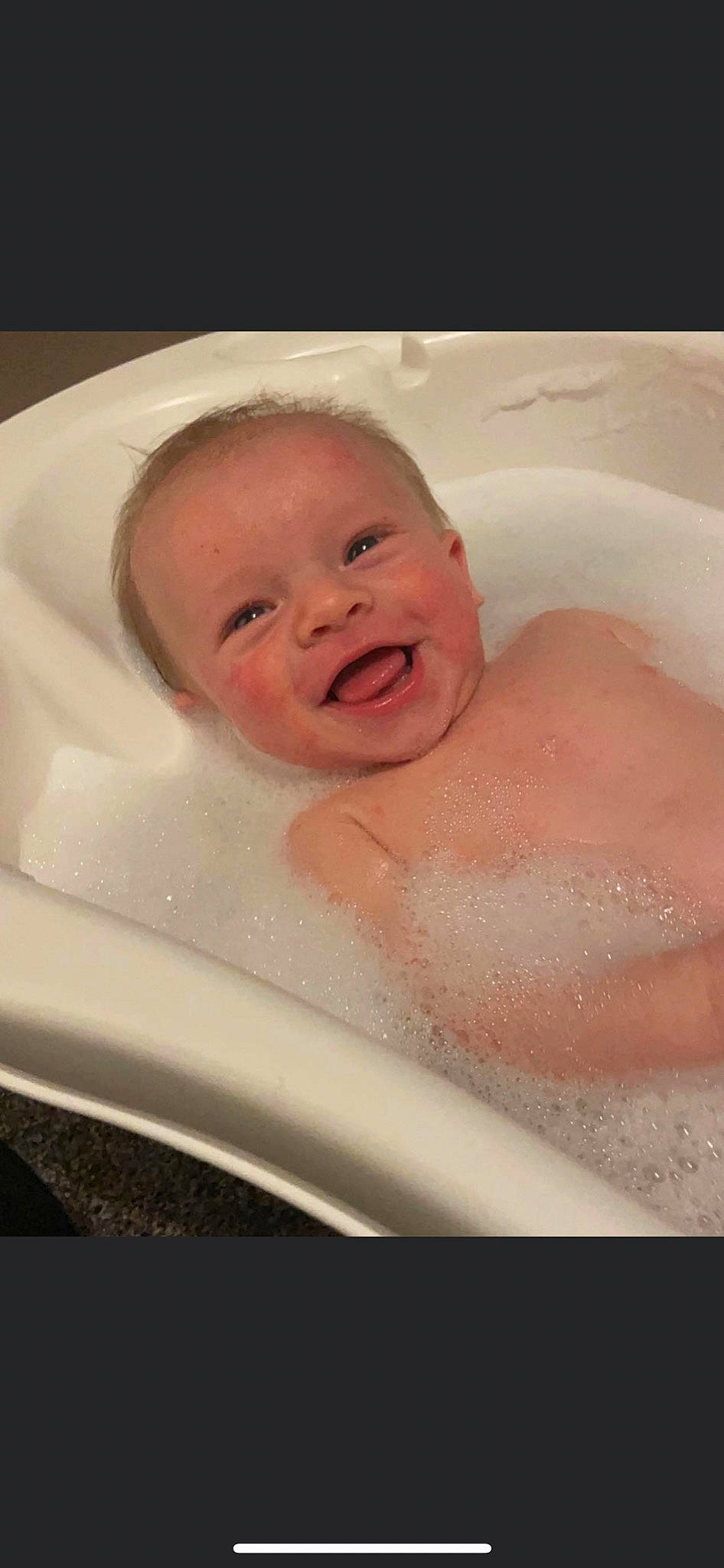 Albi is registered to the contest to win money with this photo: baby, baby_bathing, bathing, bathroom, bathtub, cheek, chest, eye, eyelash, fluid, foam, fun, happy, jaw, lip, liquid, person, skin, smile, toddler