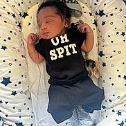 Porsius joined the competition — help win amazing prizes! baby, infant, sleeping, clothing, black_outfit, crib, bedding, stars, hat, pacifier, cushion, pattern, newborn, child, indoors, cute, resting, striped_socks, soft, cozy
