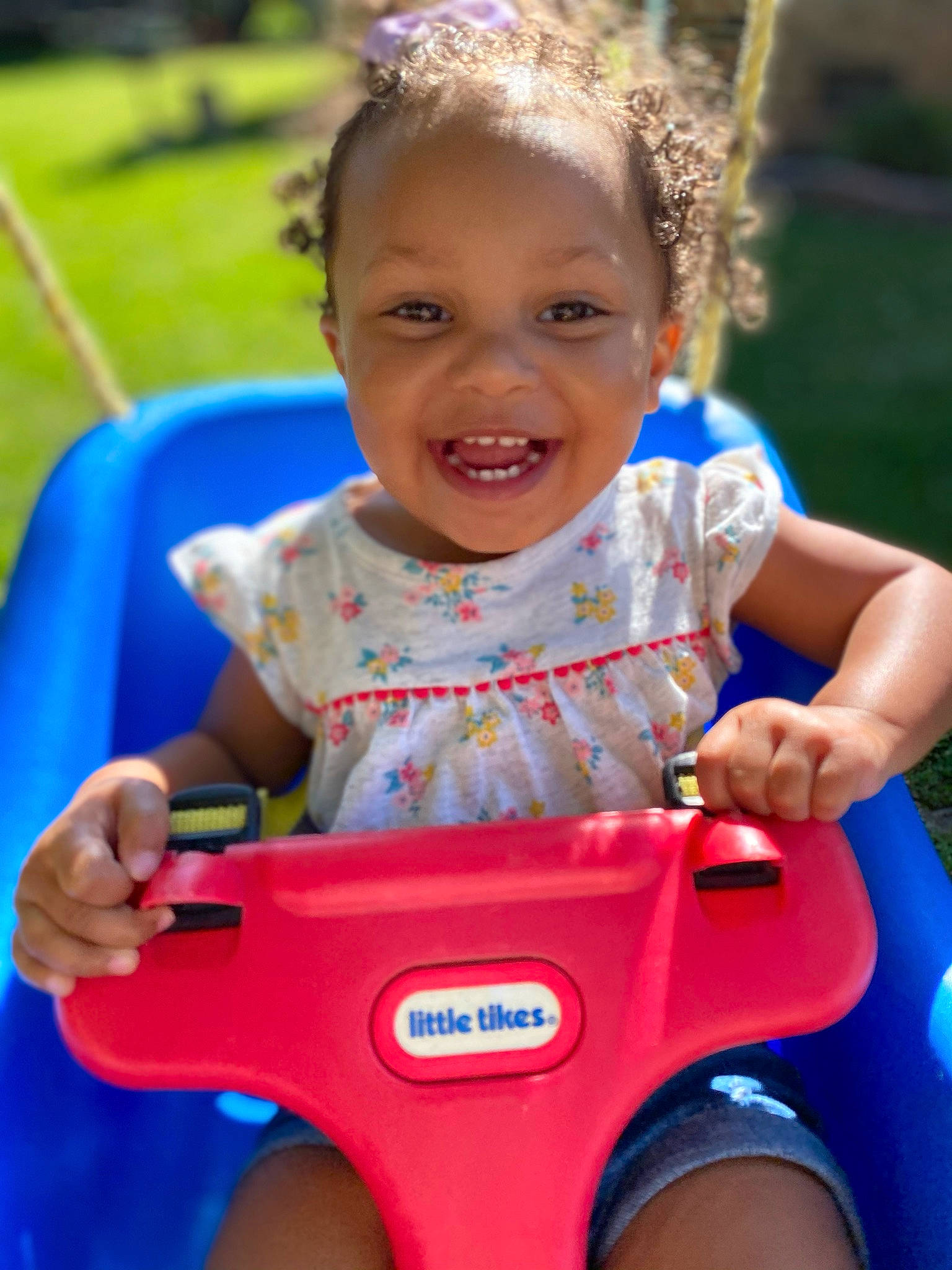 Ariana joined the competition — help win amazing prizes! baby_playing_with_toys, baby_toddler_clothing, blue, face, facial_expression, finger, fun, green, happy, human_body, joy, leisure, organ, person, photograph, pink, product, riding_toy, skin, smile