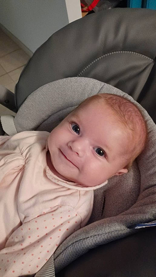 Justine participe au concours pour gagner de l'argent avec cette photo : baby, baby_products, baby_toddler_clothing, cheek, child, chin, comfort, eyebrow, happy, hat, headgear, iris, joy, lip, person, sitting, skin, smile, toddler